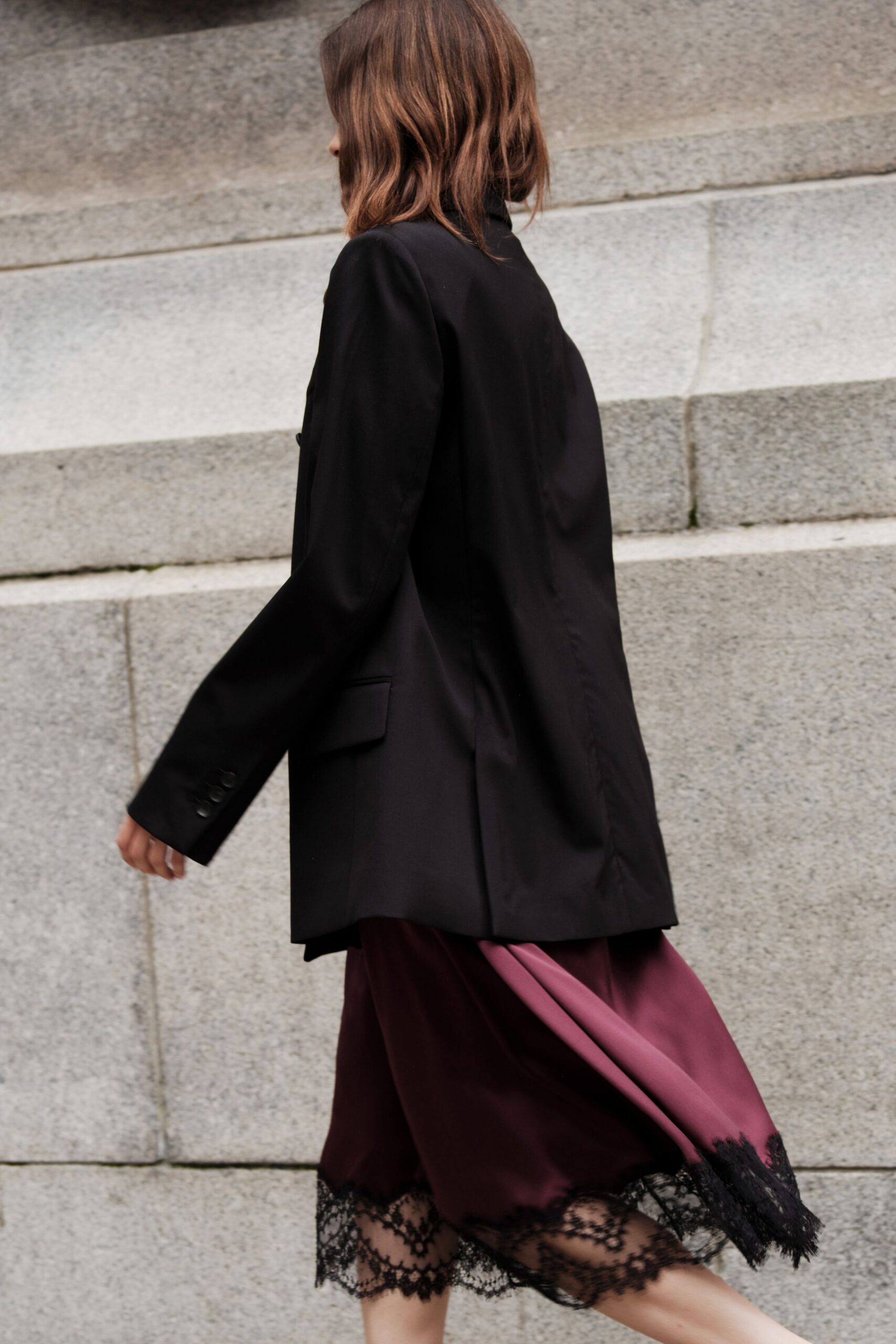 black blazer and purple dress