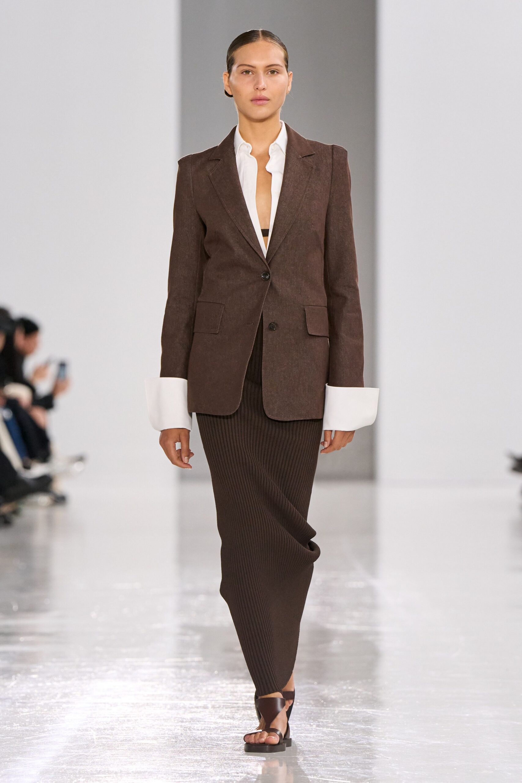 brown tailored blazer with pleated skirt