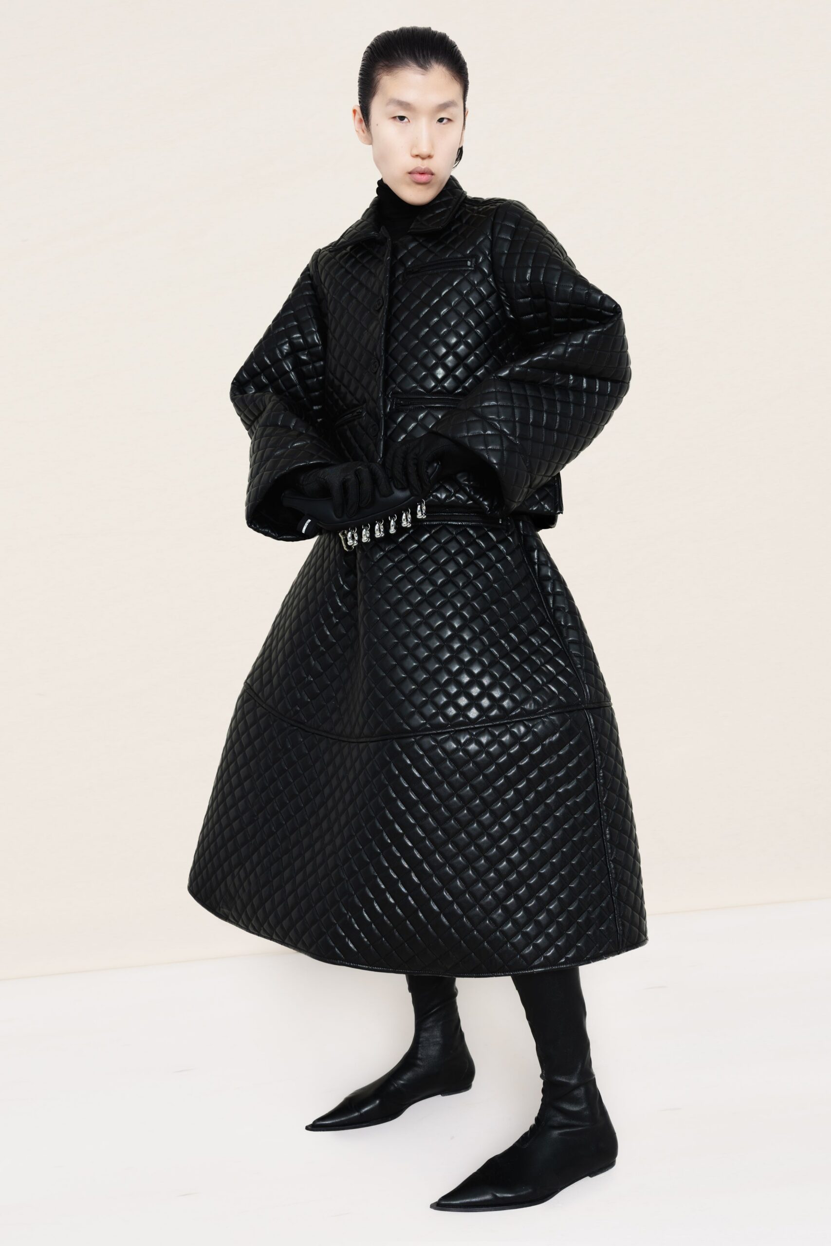 black leather long-sleeve collared oversized quilted coat