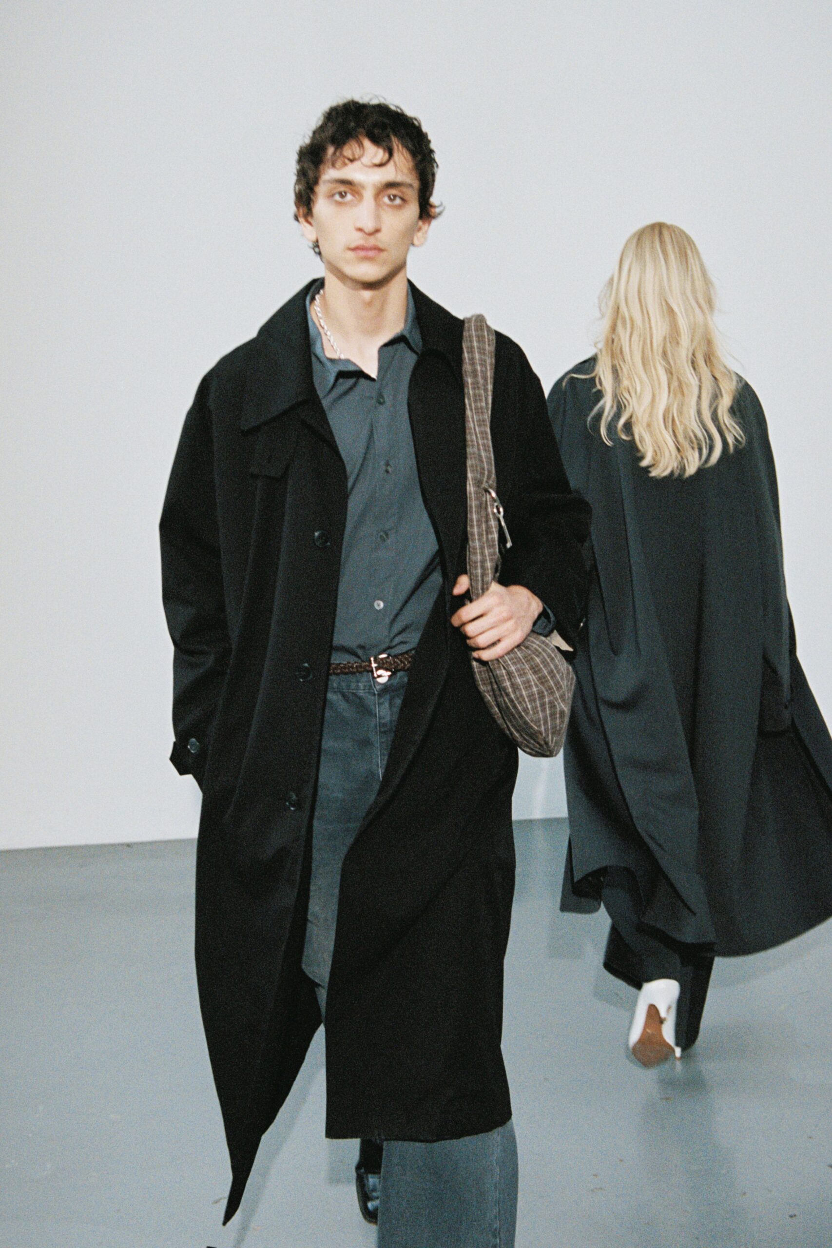 black wool coat with gray shirt