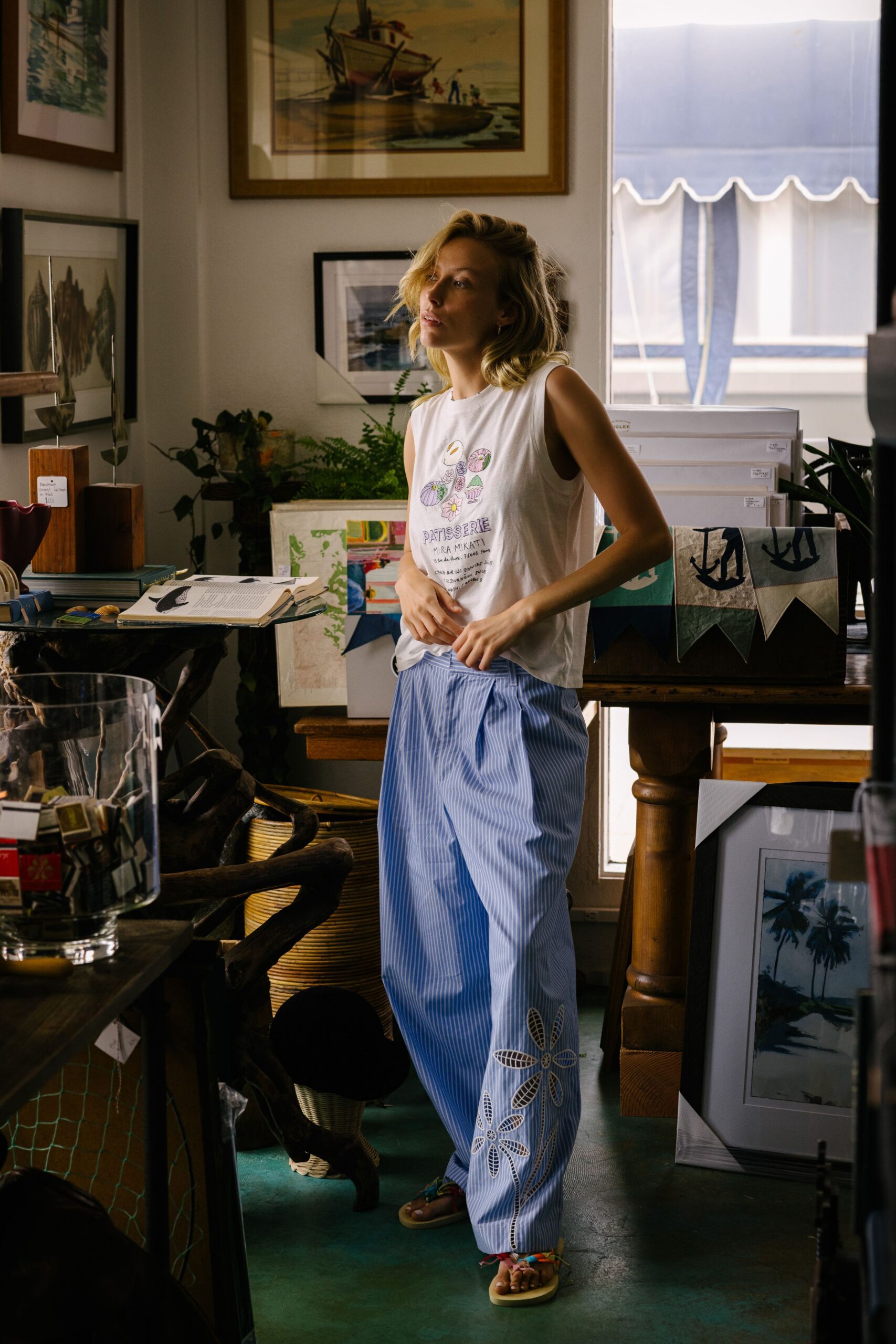 white tank-top blue wide-leg pants