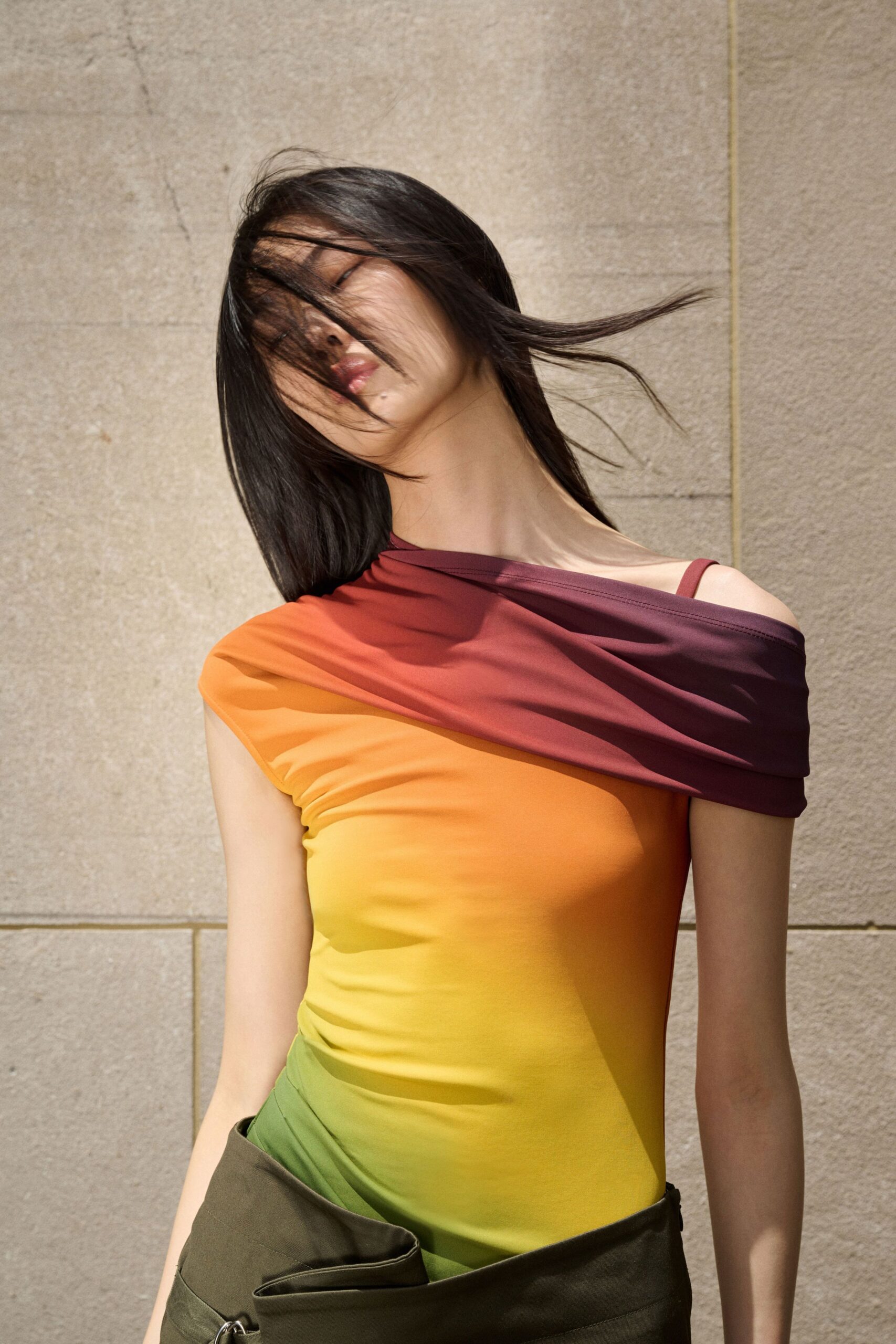 colorful off-shoulder top with cargo pants