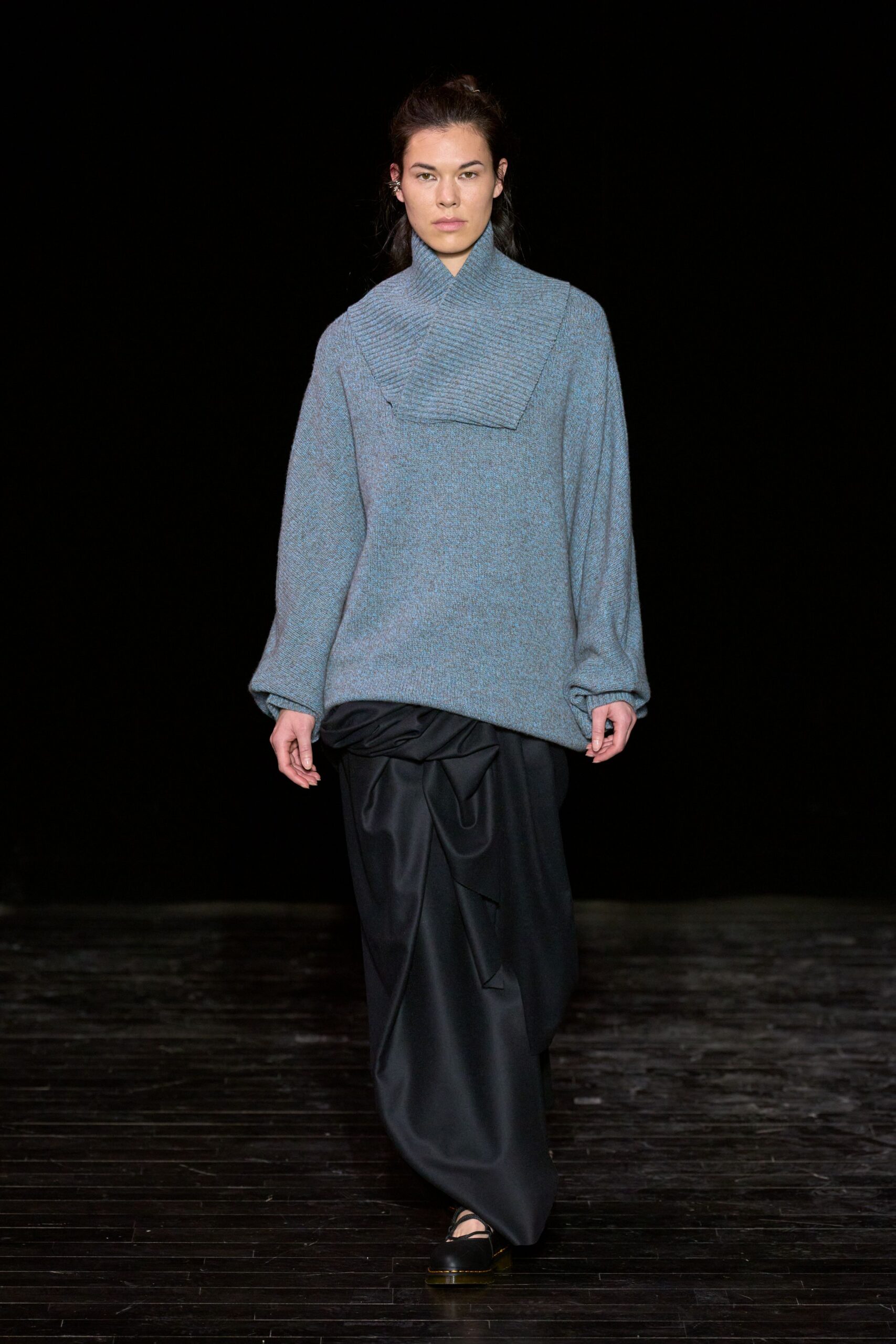 blue wool relaxed top with black skirt