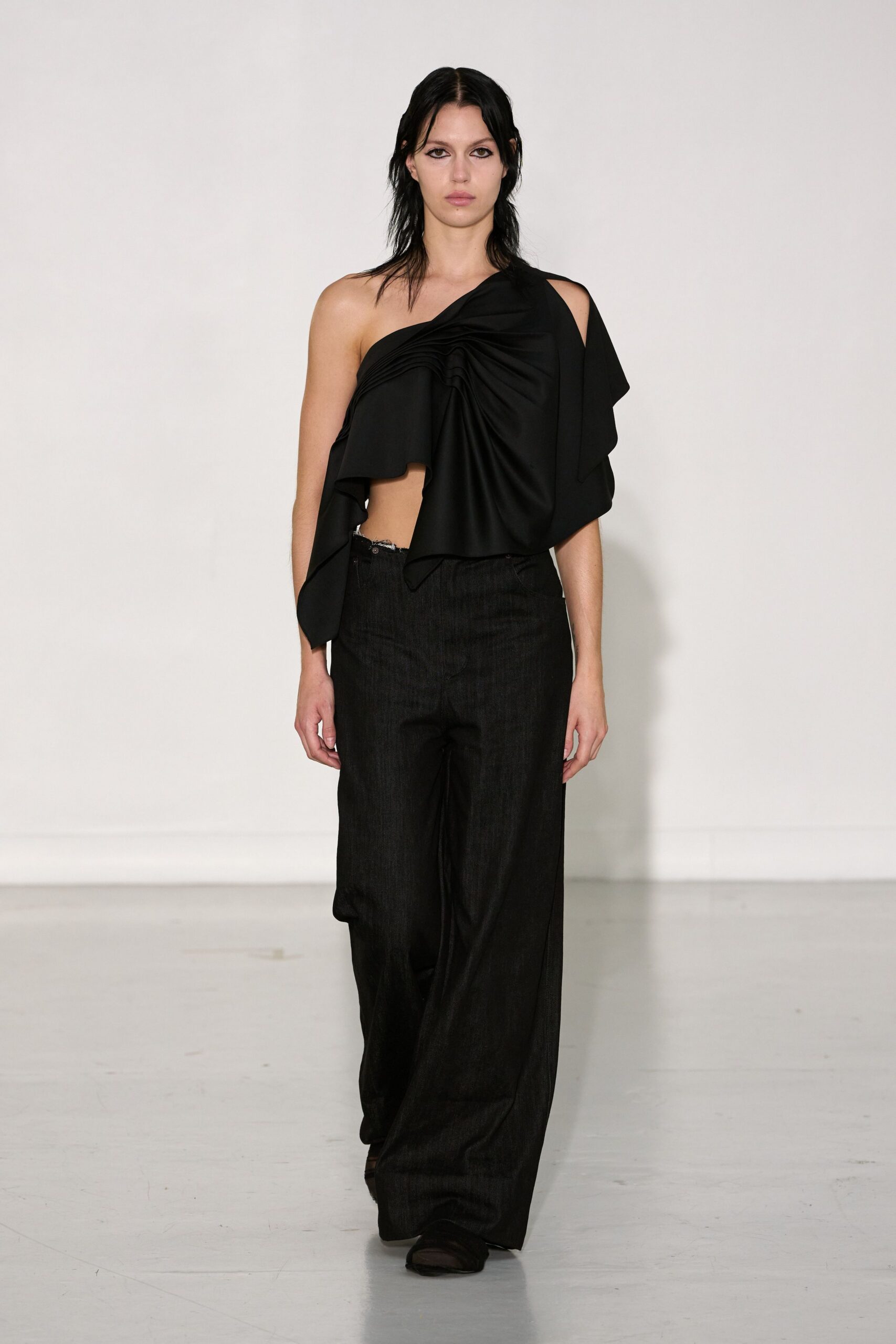 black silk asymmetric top with wide-leg pants