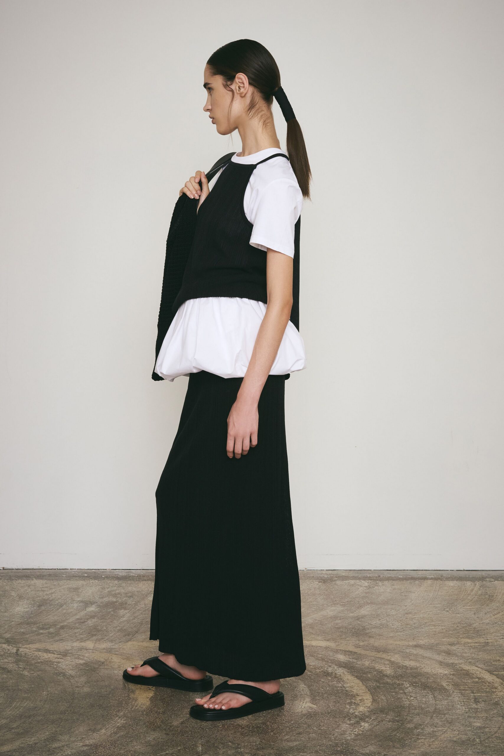 black cotton sleeveless fitted pleated vest
