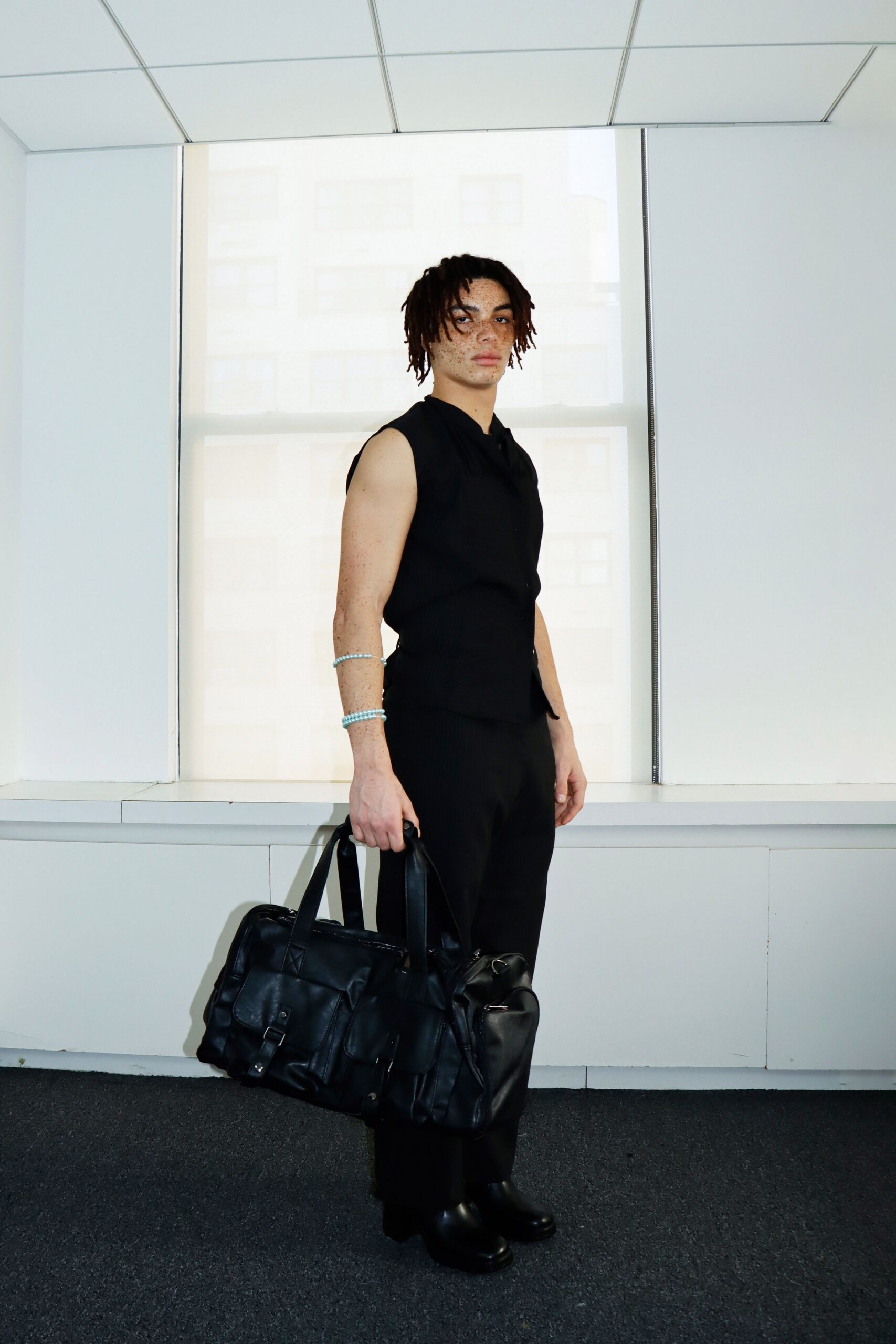 black fitted vest and pants