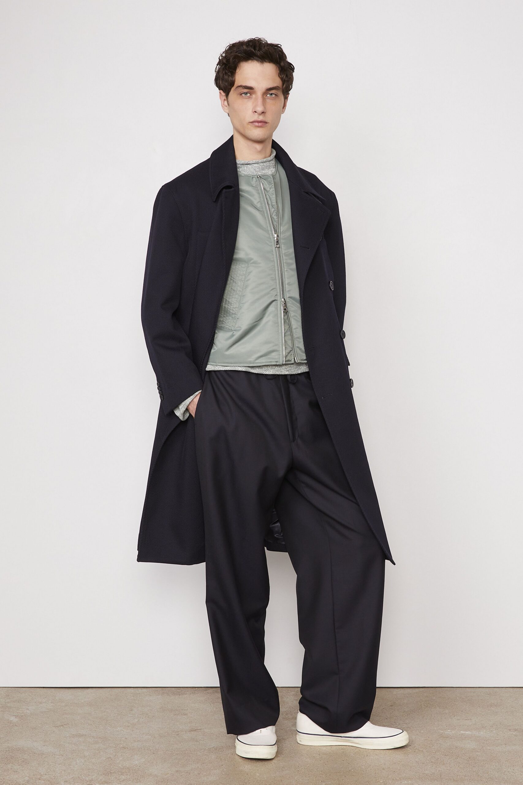 black wool long-sleeve collared structured buttoned coat