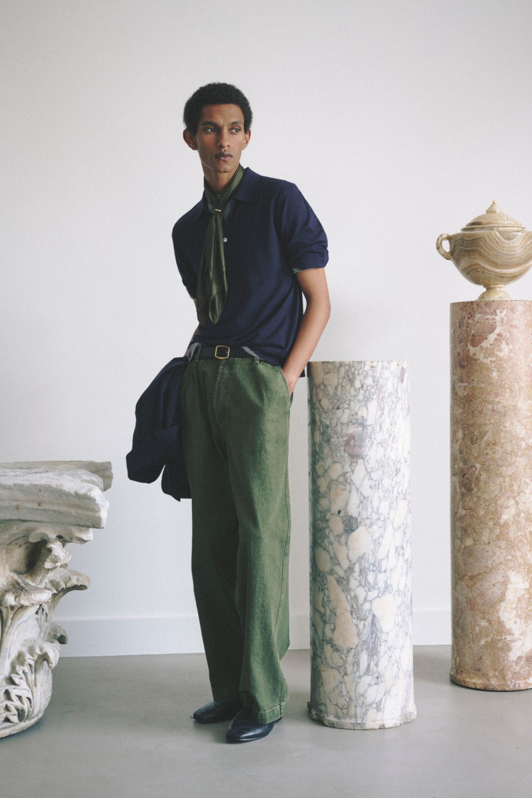 navy shirt green pants outfit