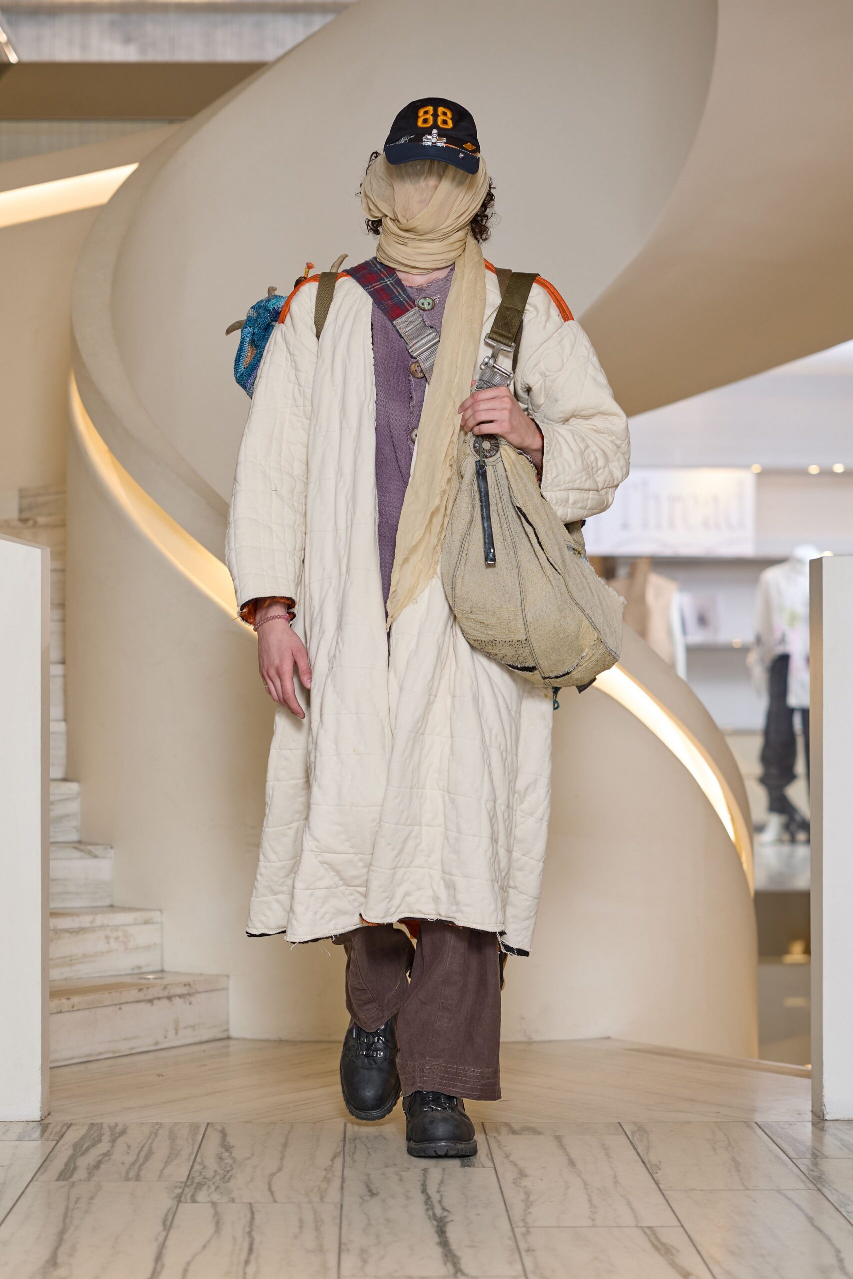 beige relaxed coat with accessories