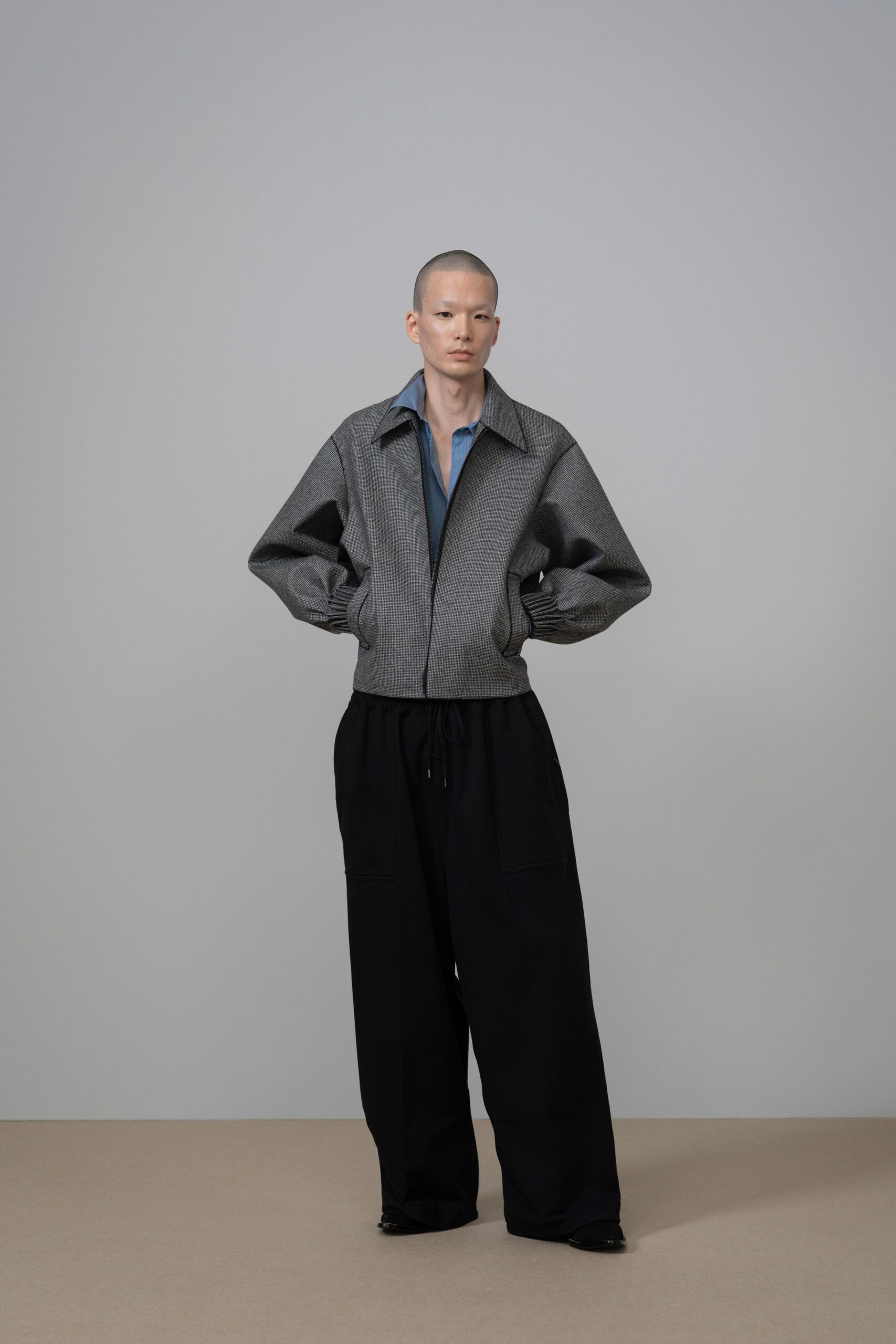 gray relaxed jacket and black pants