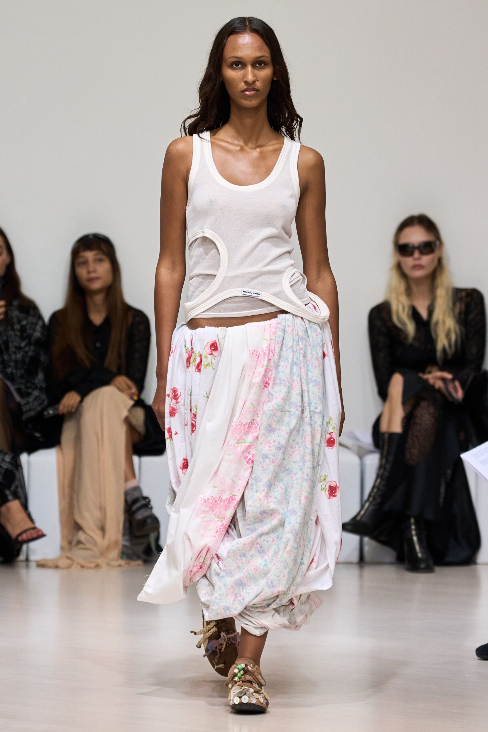 white fitted top with floral skirt