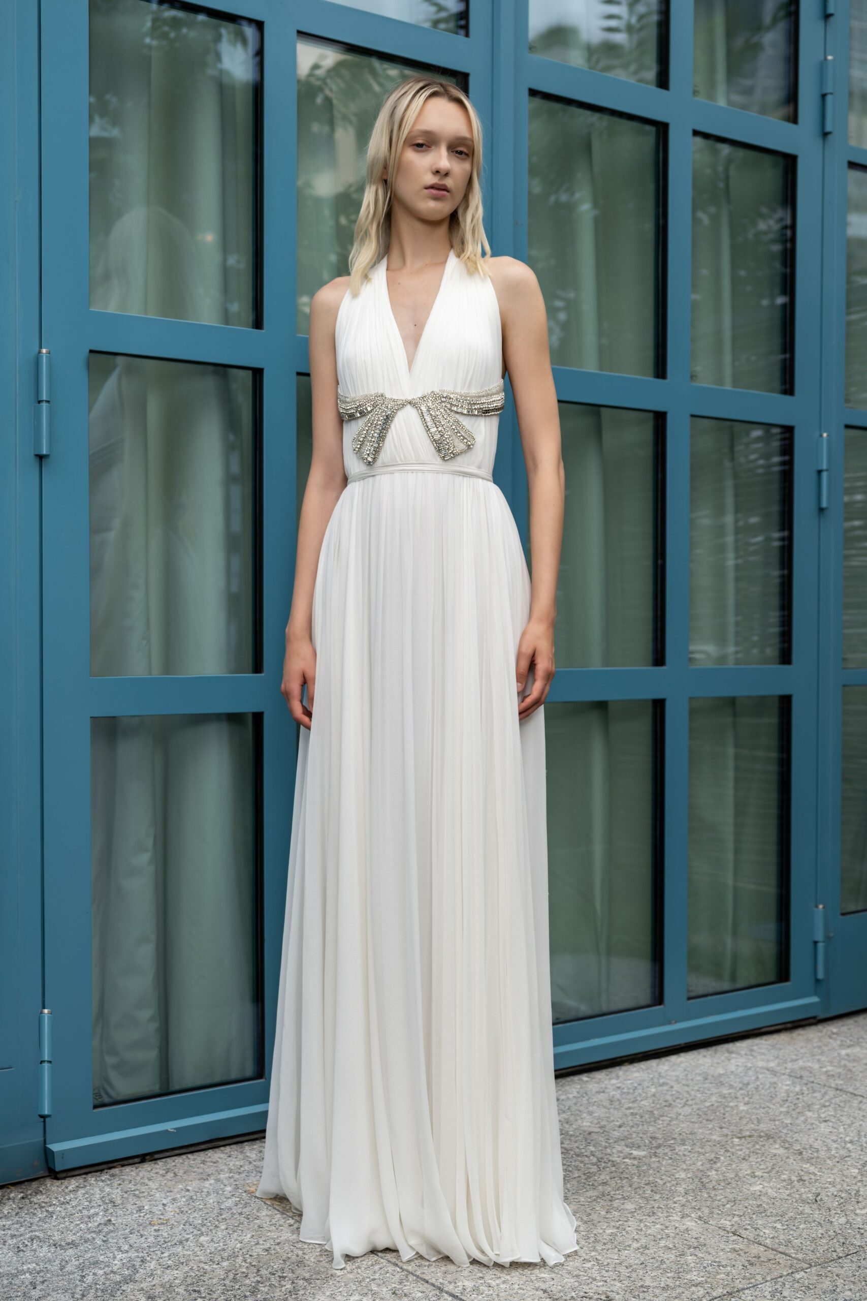white silk sleeveless gown