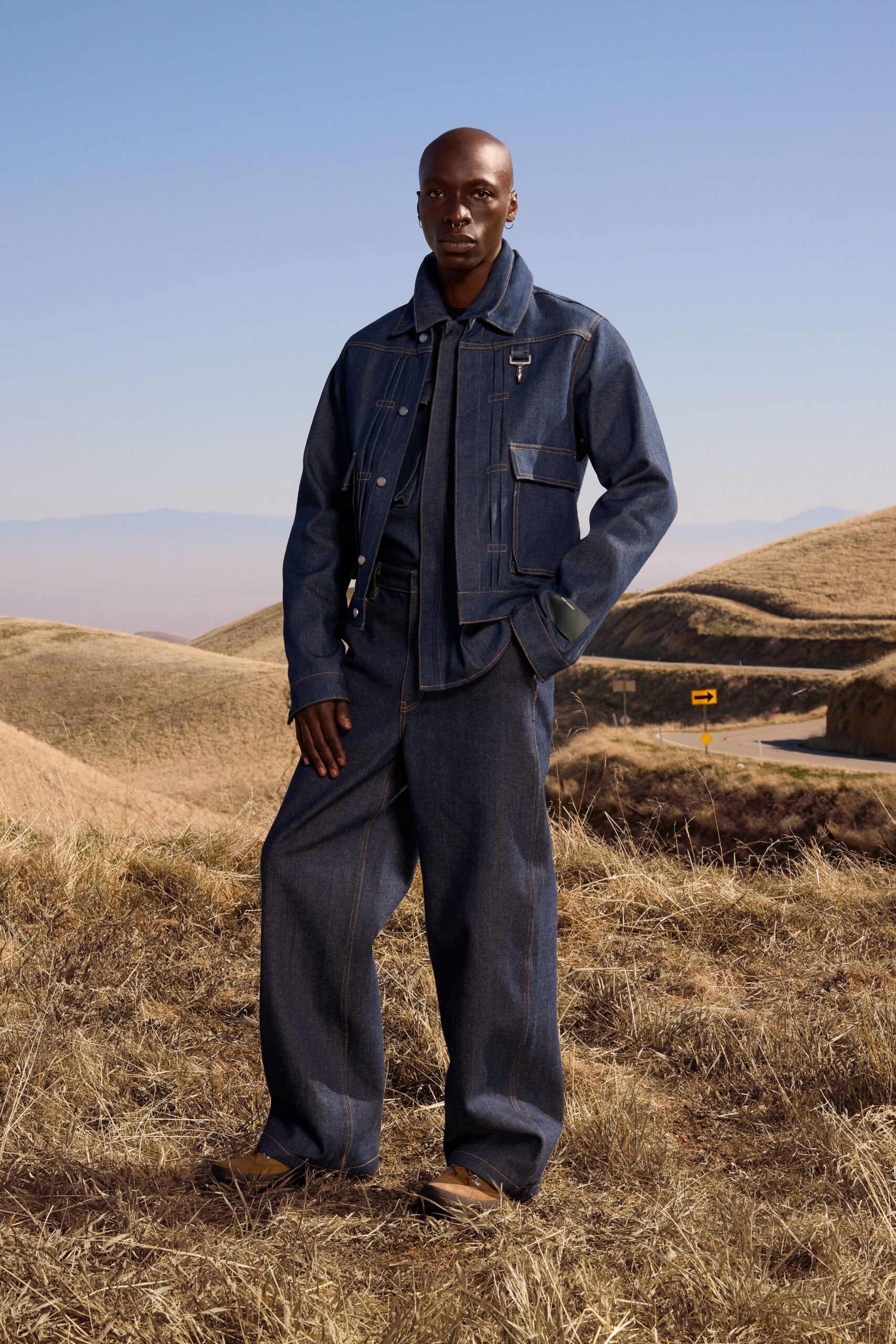 blue denim long-sleeve collared relaxed buttoned pockets jacket
