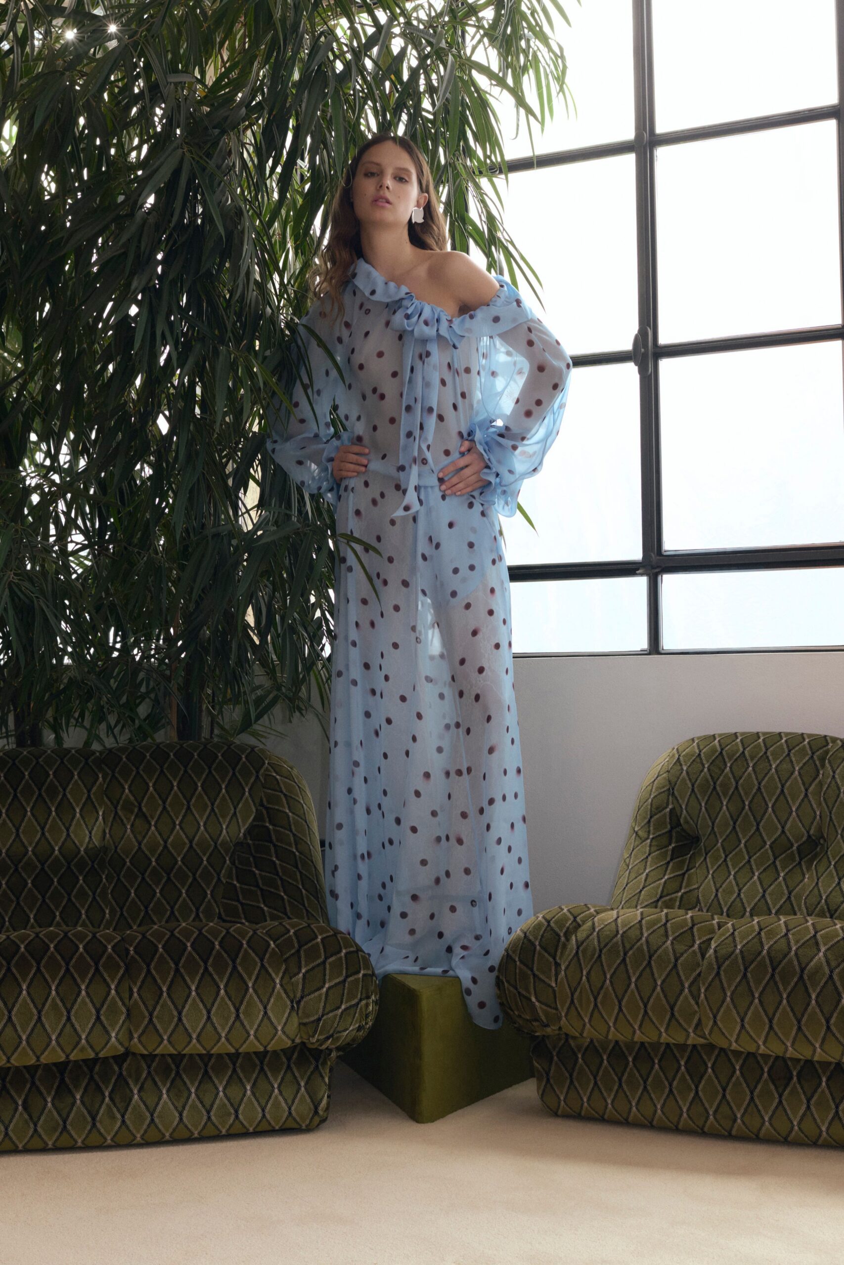 blue polka-dot flowing dress