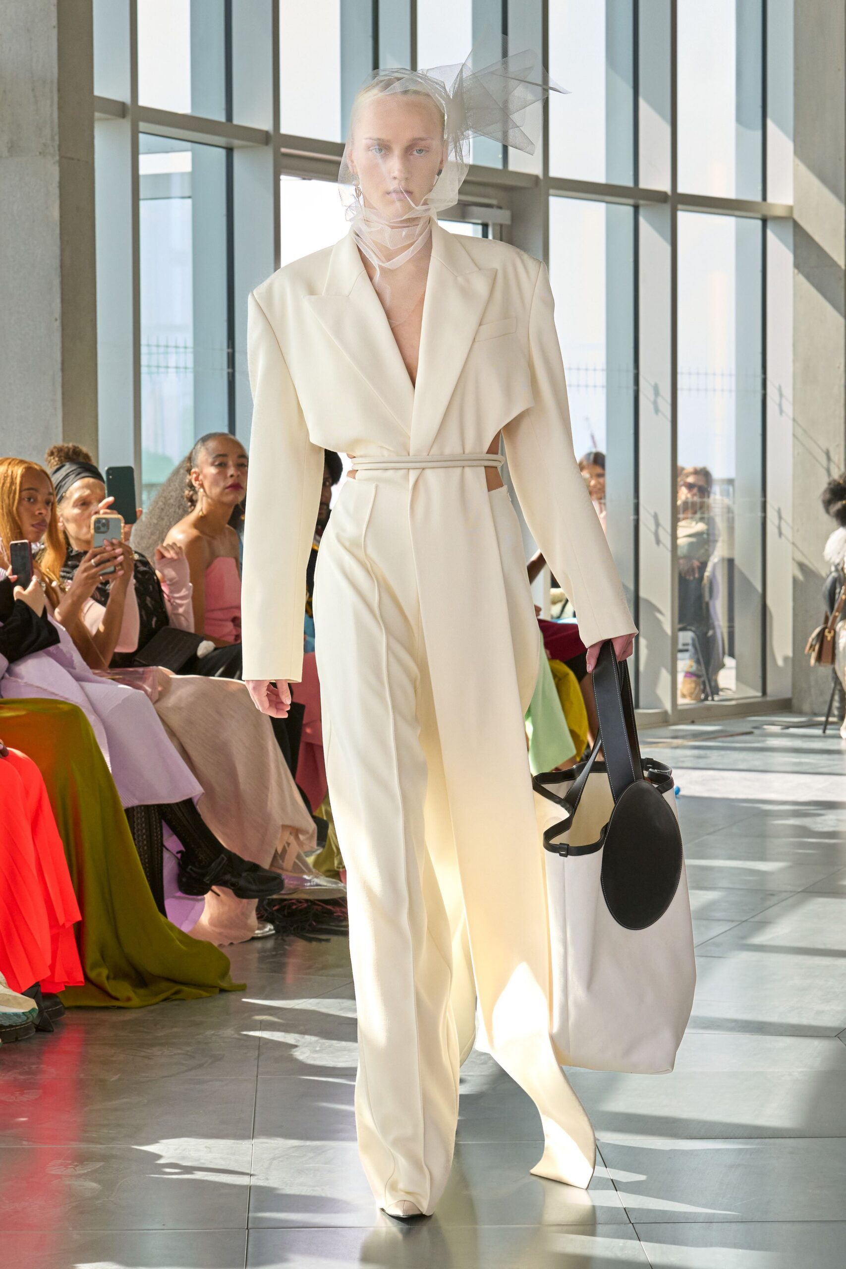 white fitted jumpsuit with bag