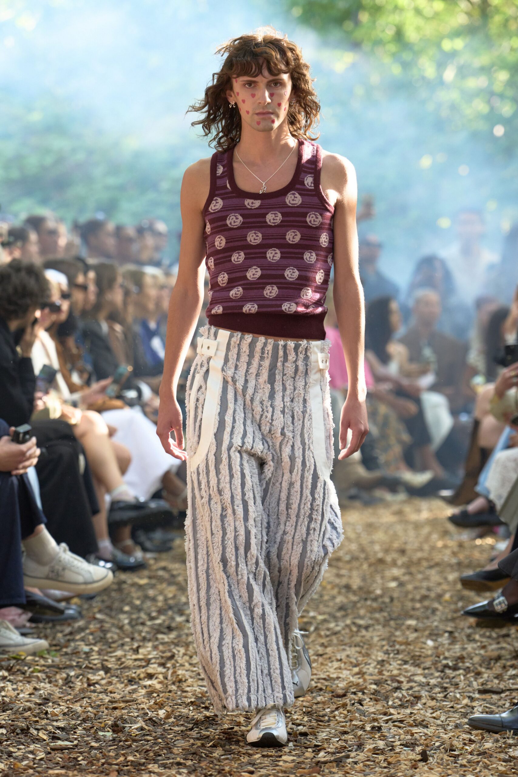 red printed tank-top with striped pants