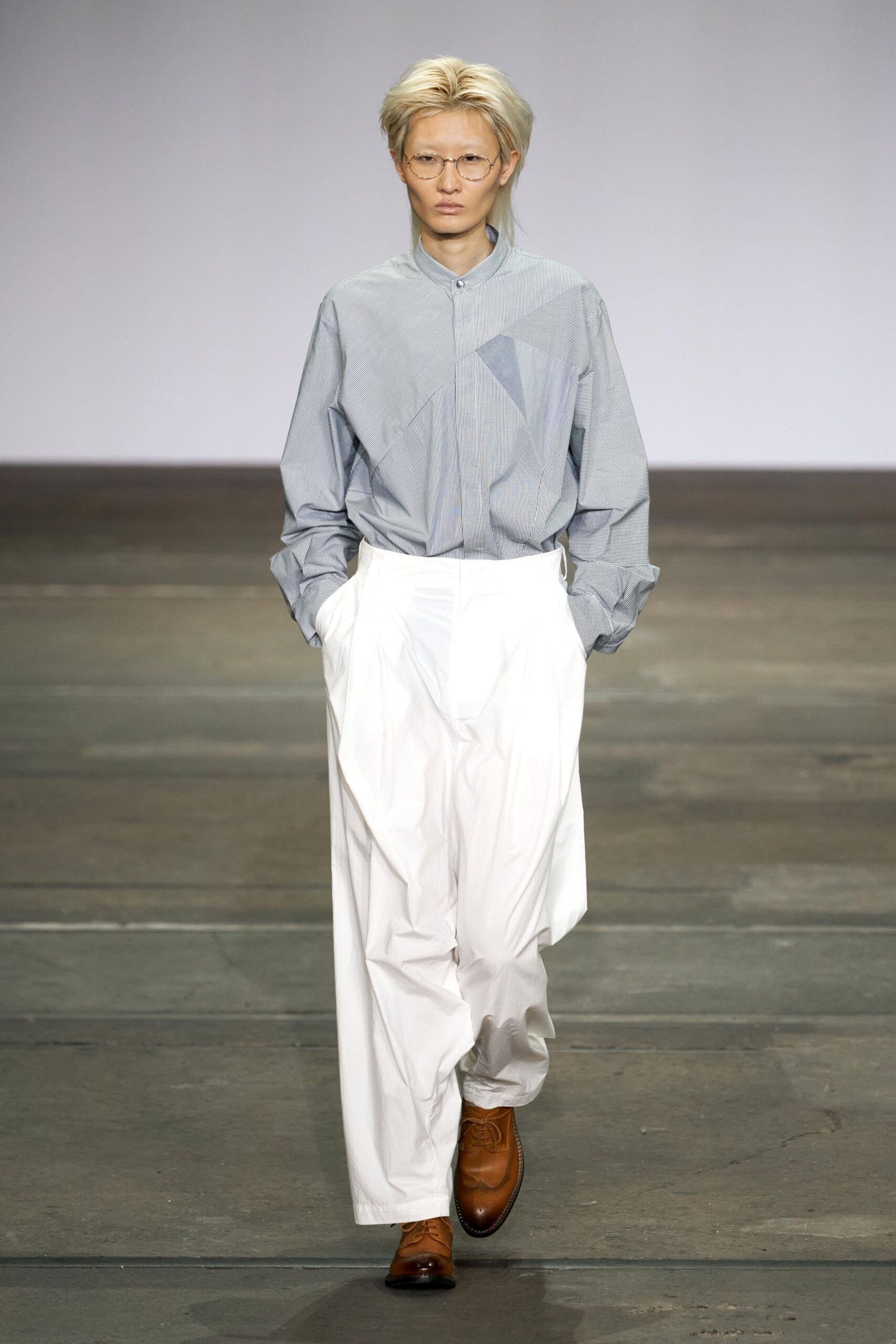 asymmetric blue and white shirt with relaxed pants