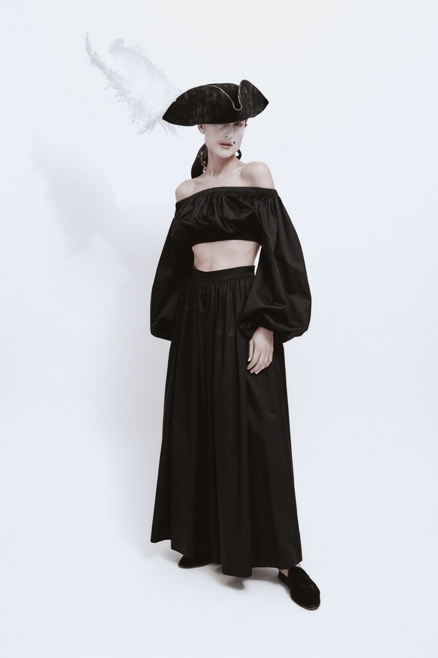 black off-shoulder top and maxi skirt