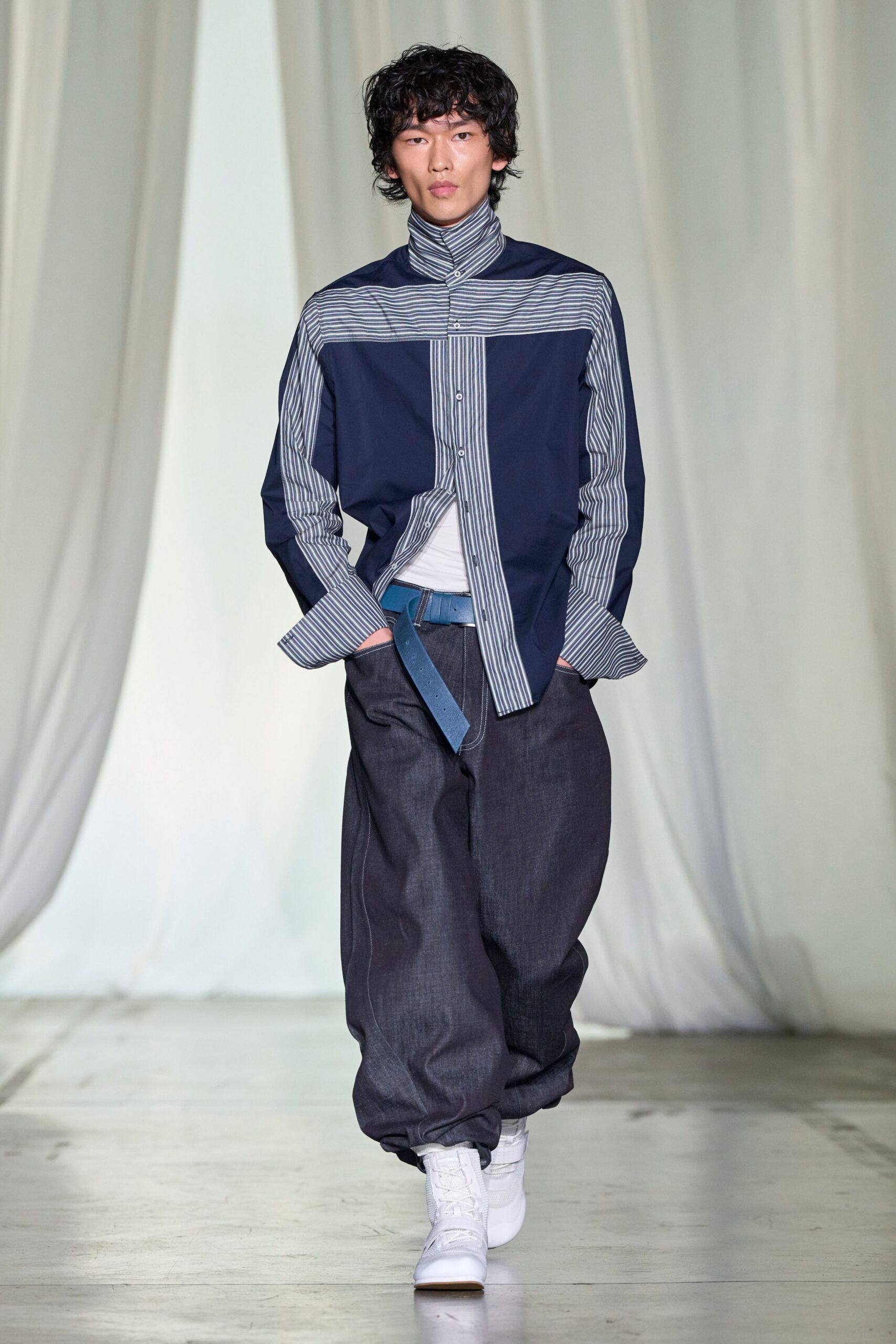 blue and white striped shirt with gray pants
