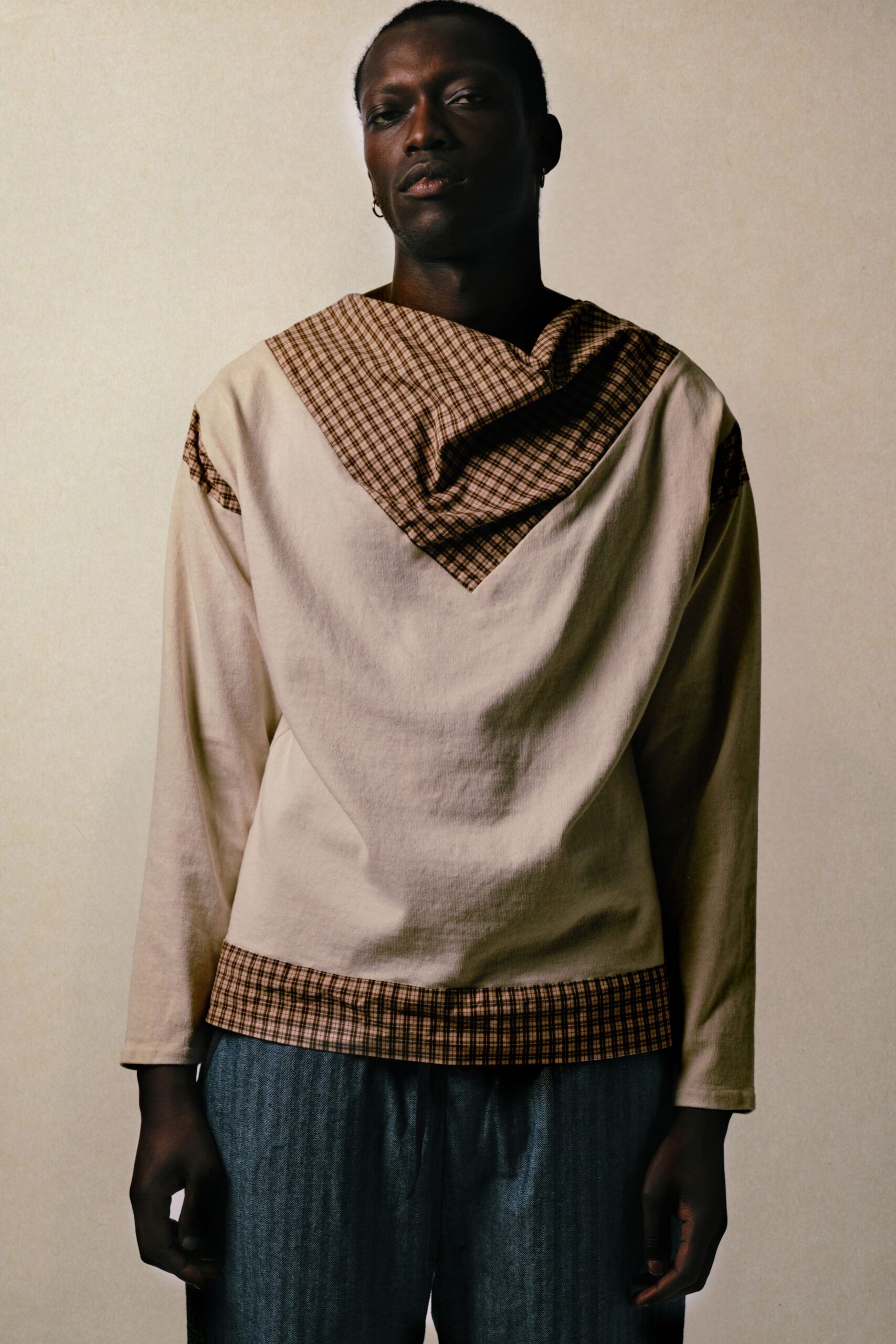 beige checked shirt with denim pants