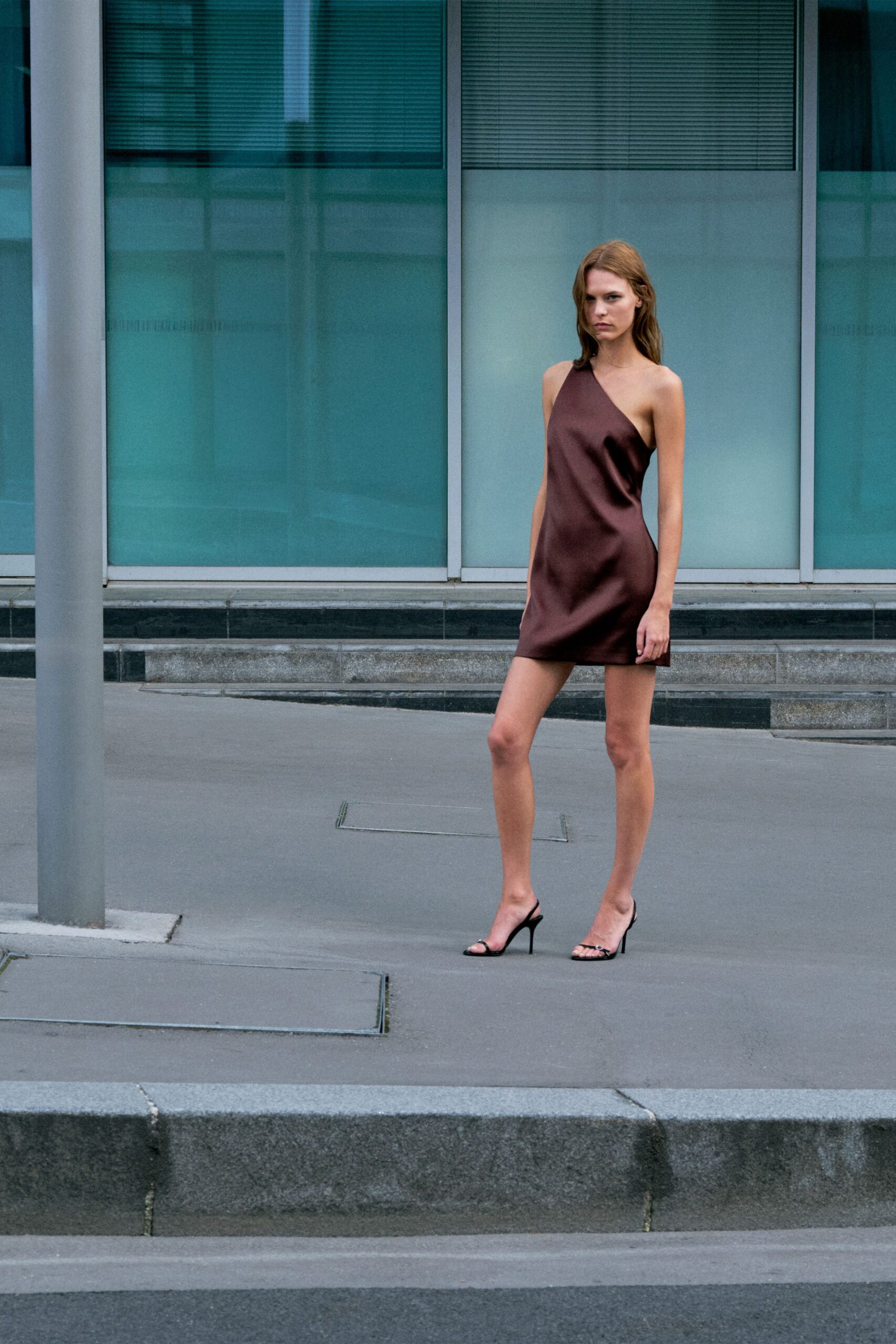 brown asymmetric mini dress with heels