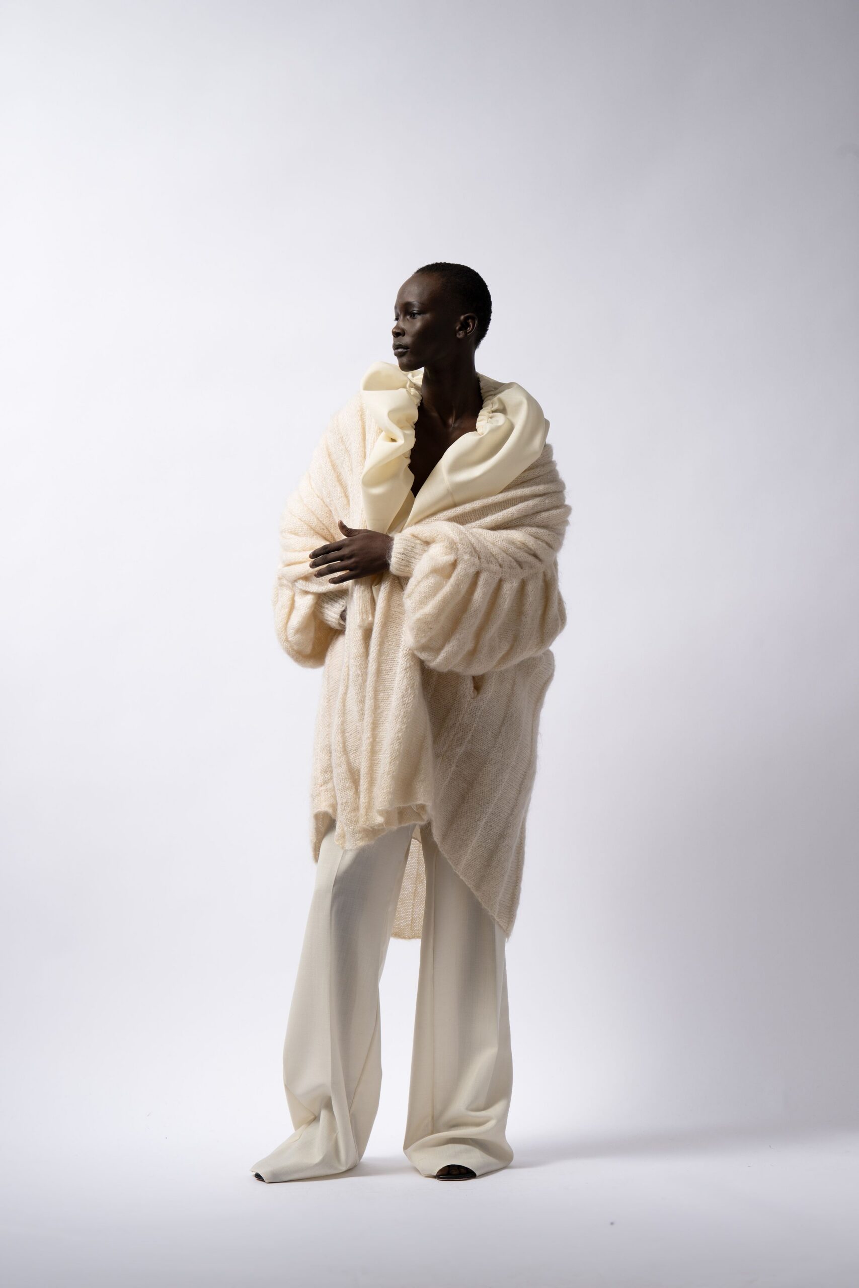 beige wool sleeveless relaxed draped poncho
