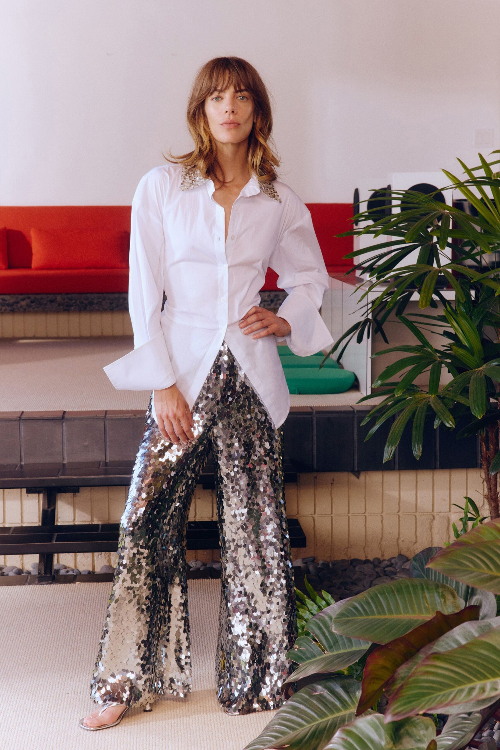 white ruffled shirt silver sequin pants