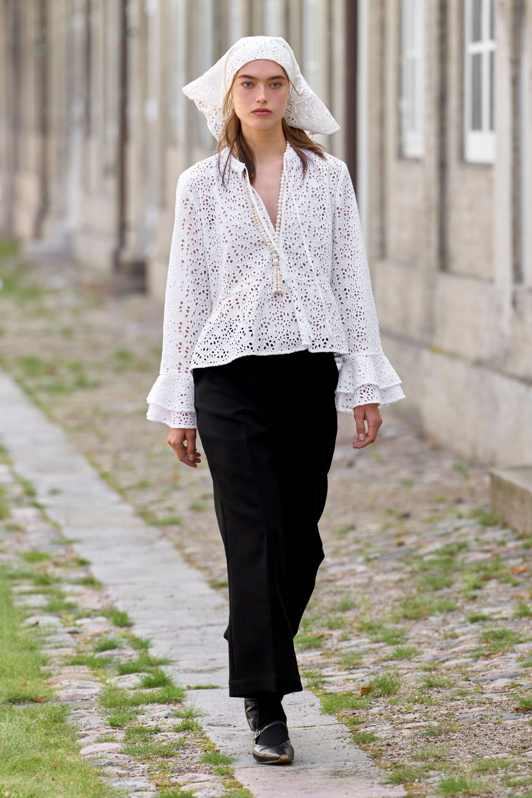 white cotton long-sleeve v-neck relaxed embroidered ruffled blouse