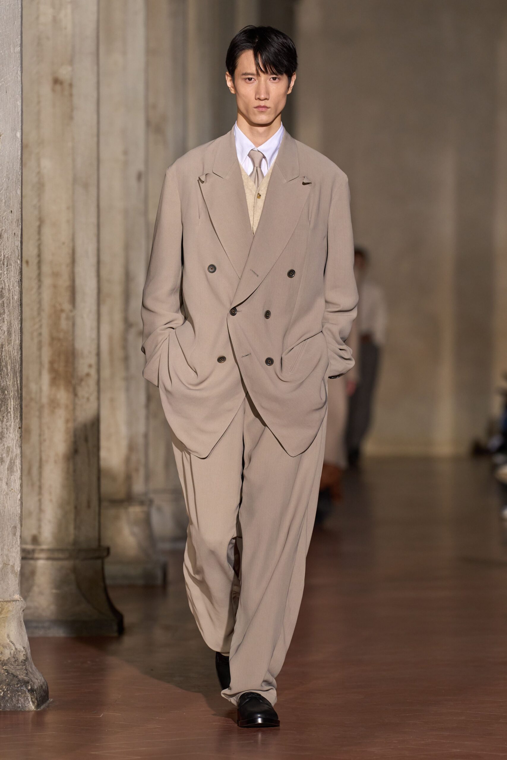 beige tailored suit with white shirt