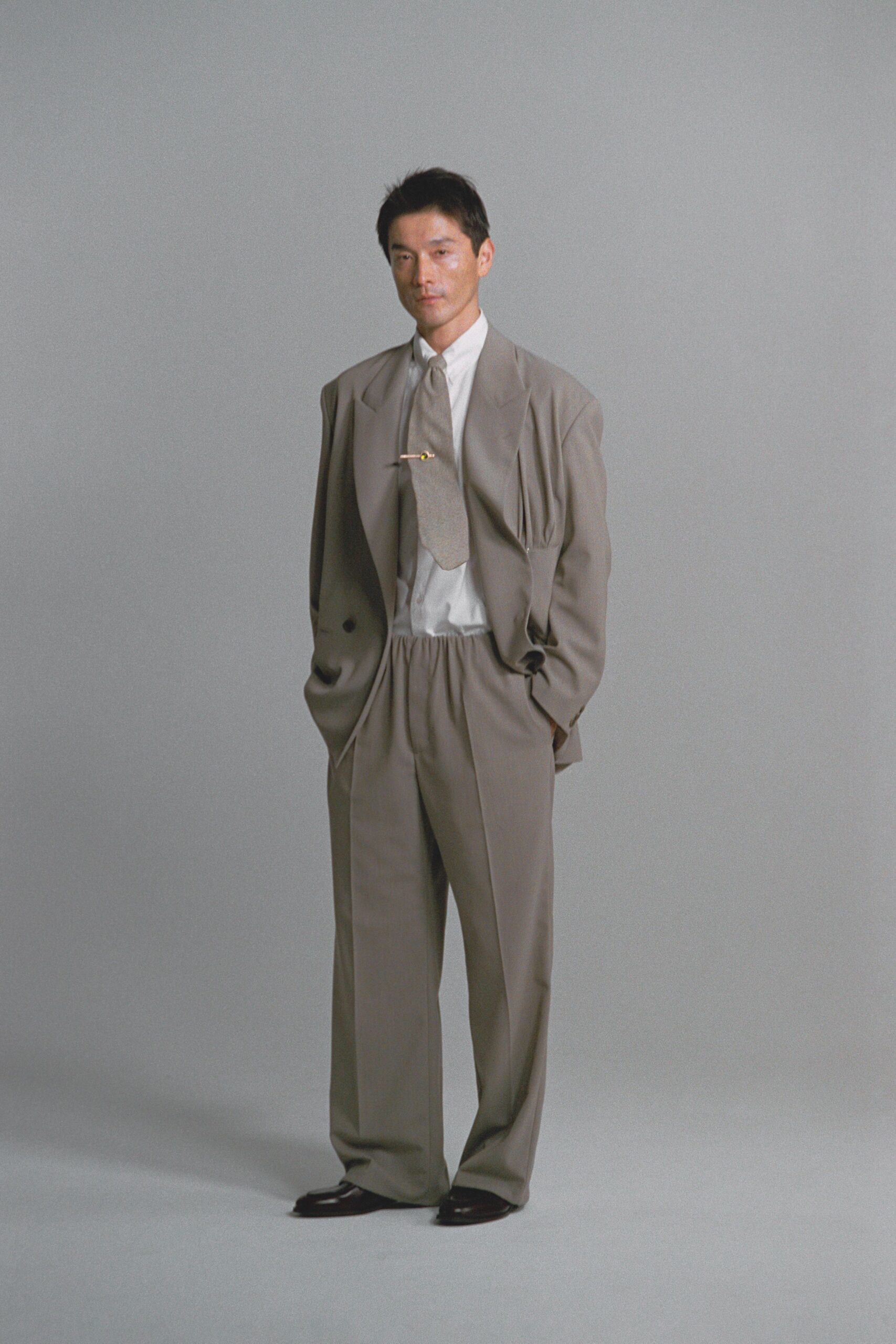 beige oversized suit with white shirt