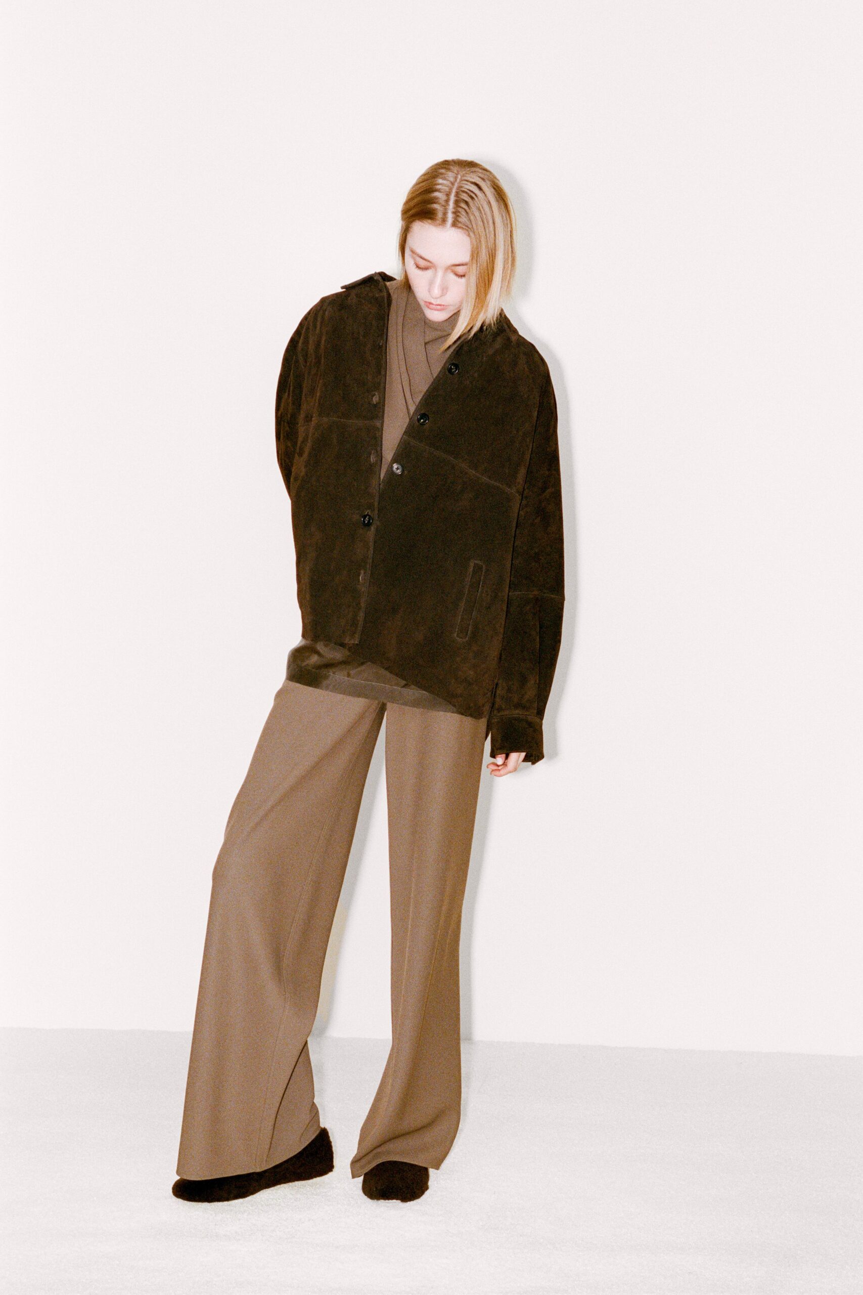 brown suede jacket with relaxed pants