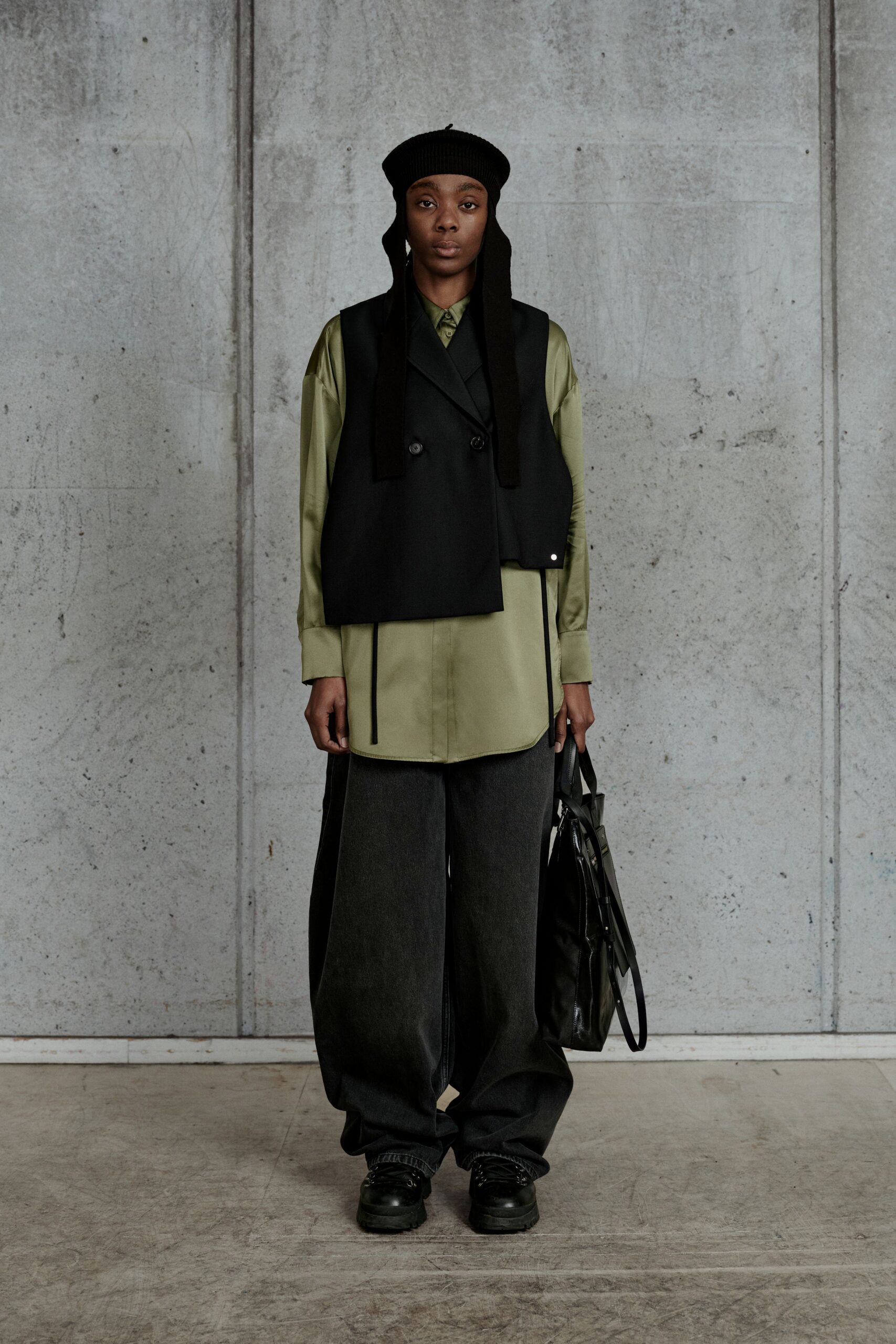 black wool long-sleeve relaxed buttoned vest