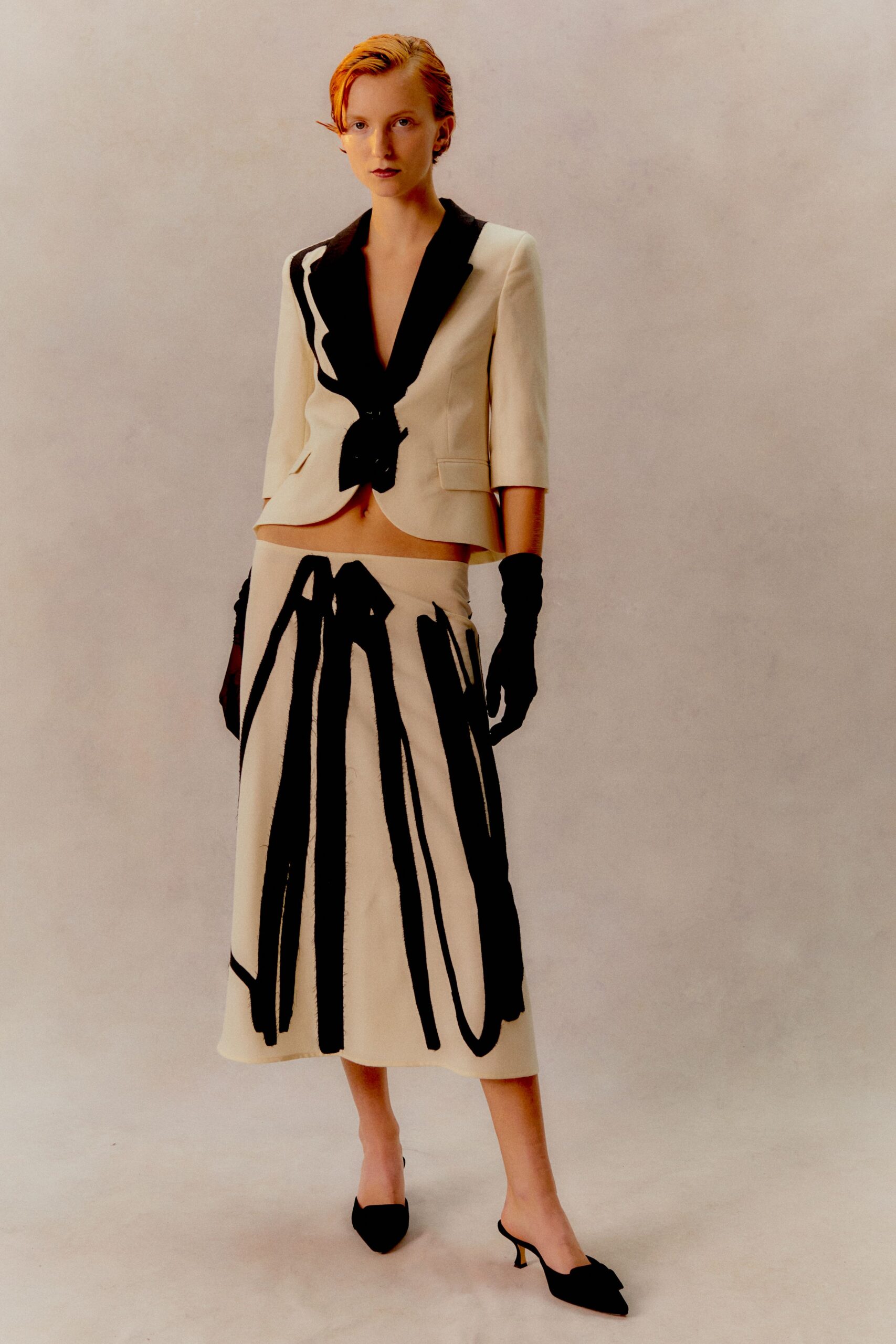 tailored white and black blazer with skirt