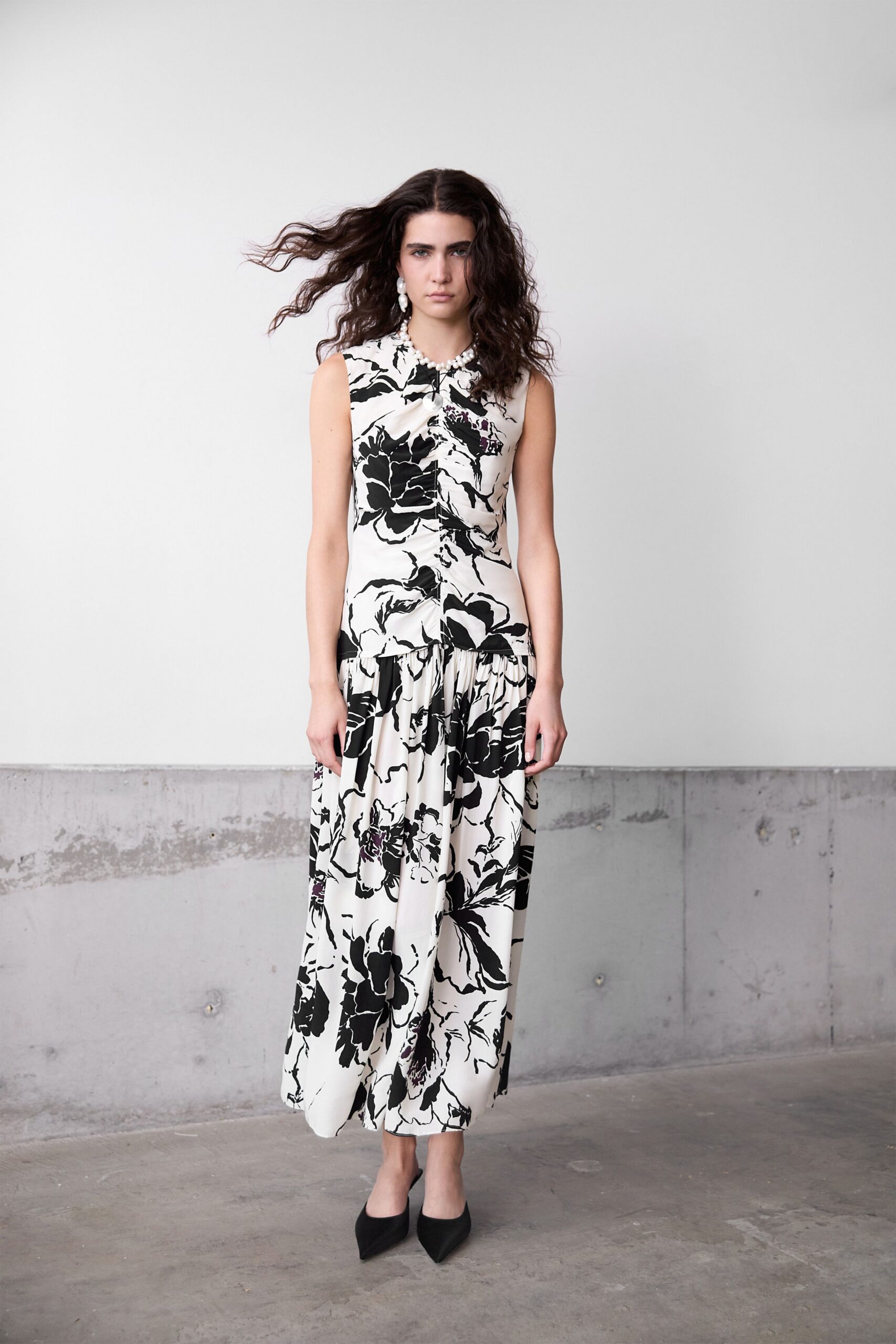 black cotton sleeveless collared fitted floral tiered dress