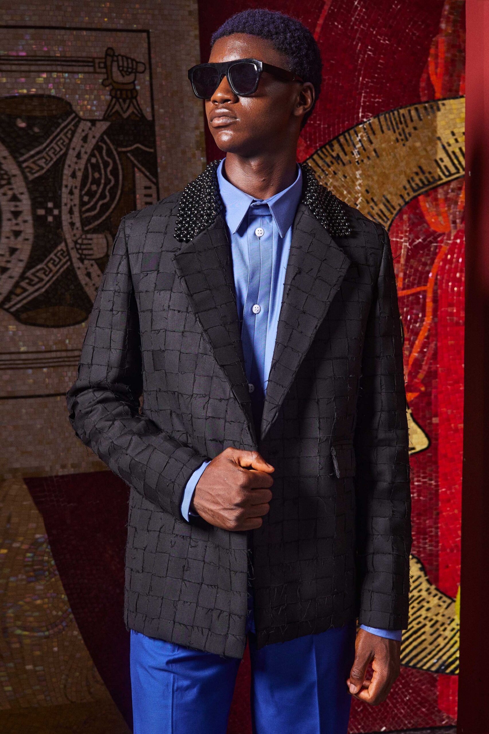 black cotton long-sleeve collared structured buttoned textured blazer