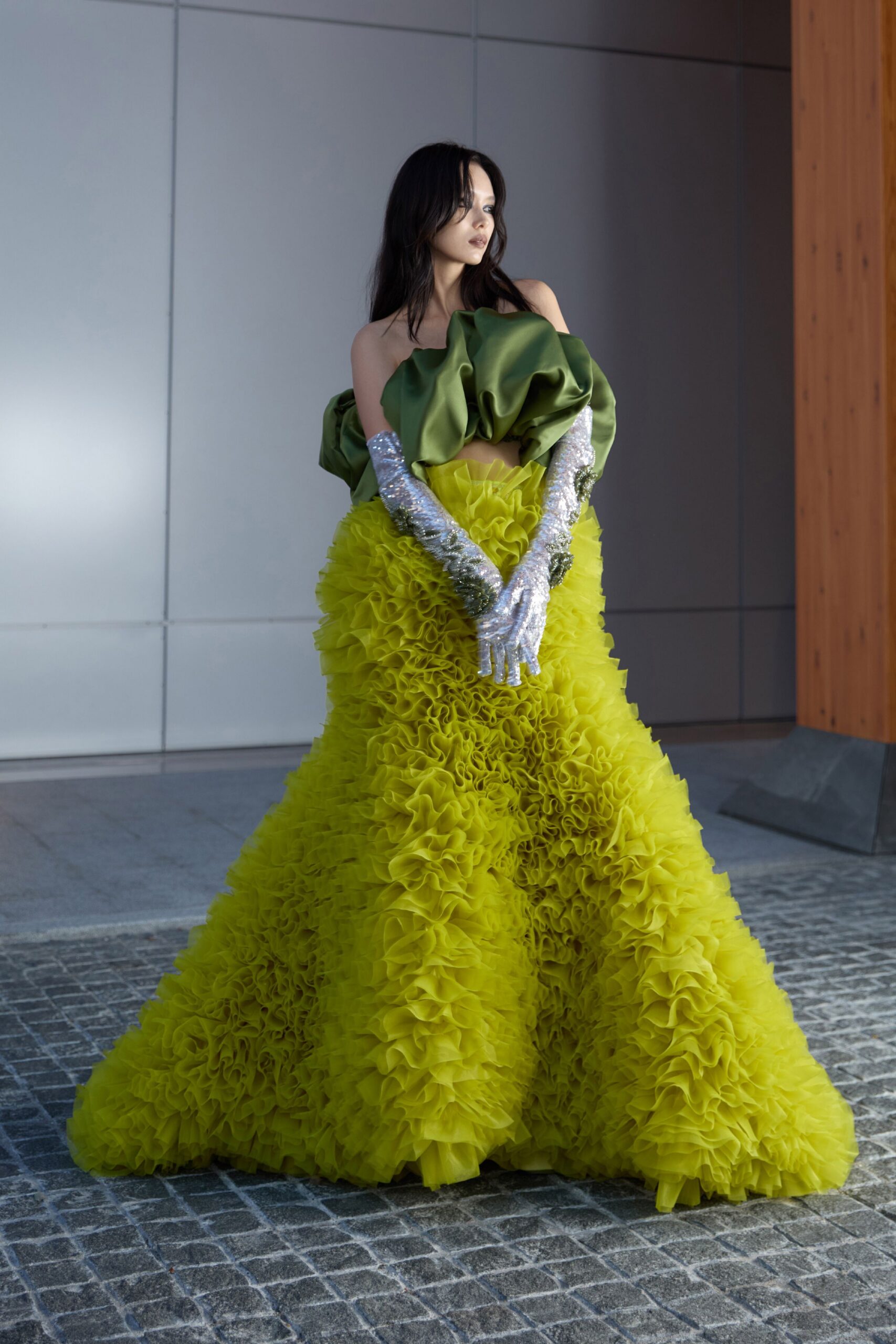 yellow silk strapless fitted ruffled maxi gown