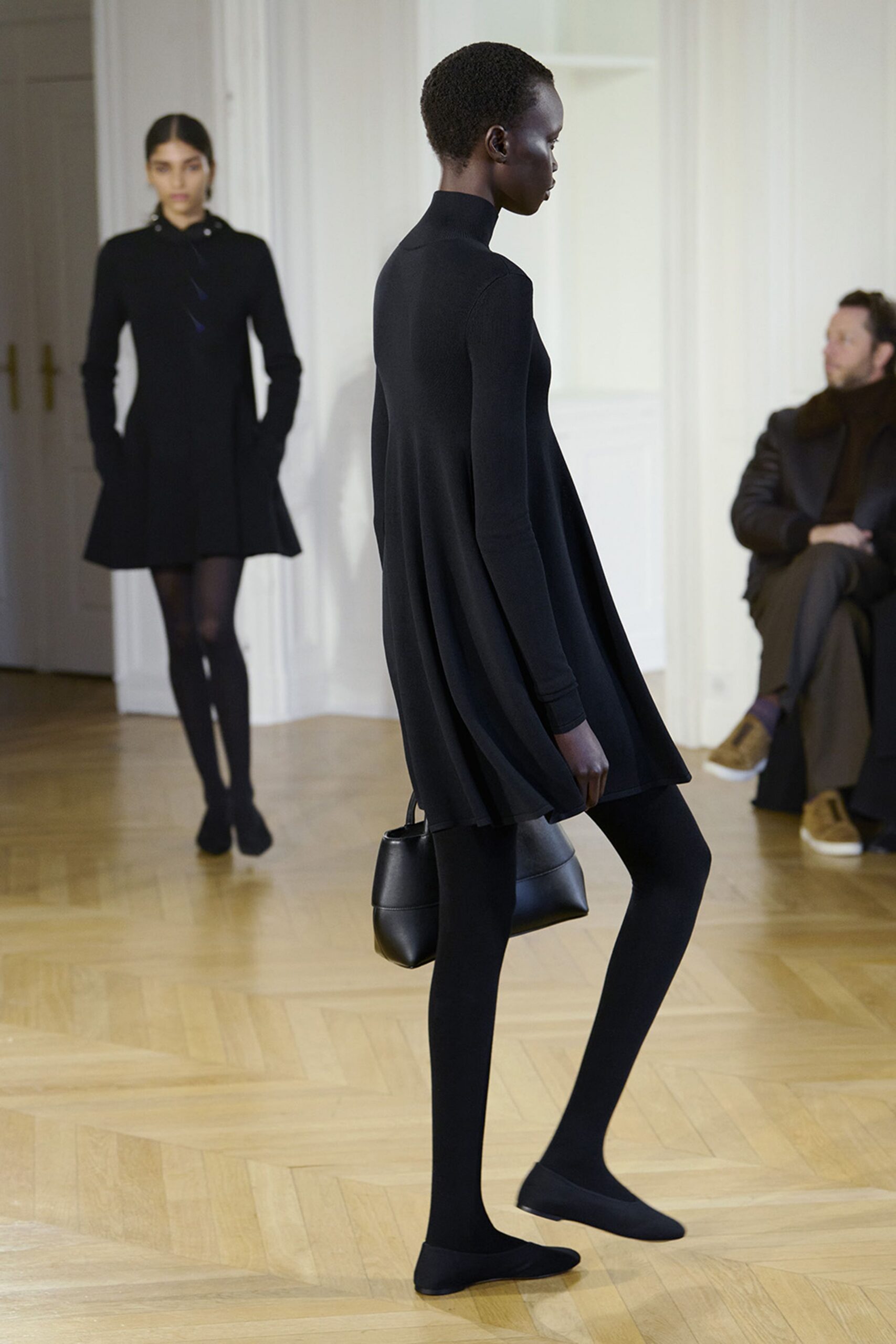 black wool long-sleeve collared structured midi coat