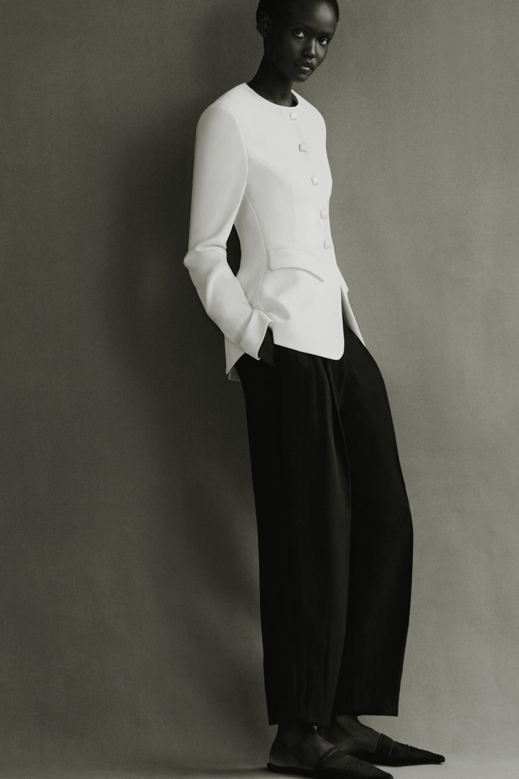 white cotton long-sleeve collared structured buttoned blazer