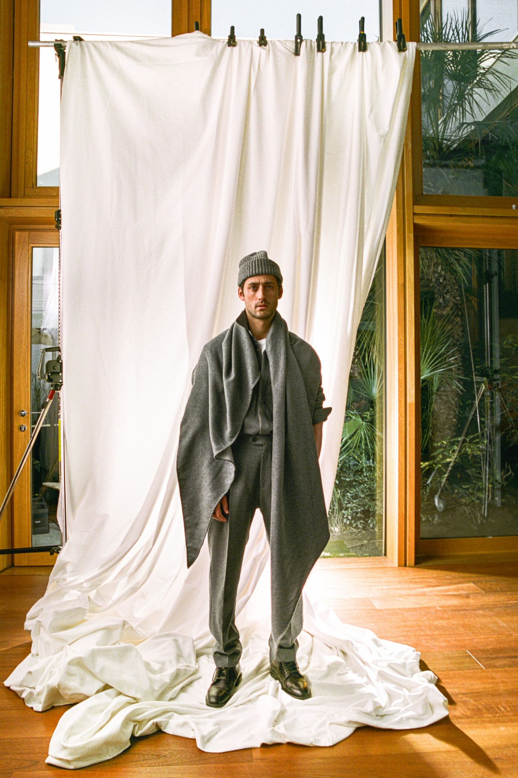 gray wool tailored suit with cape