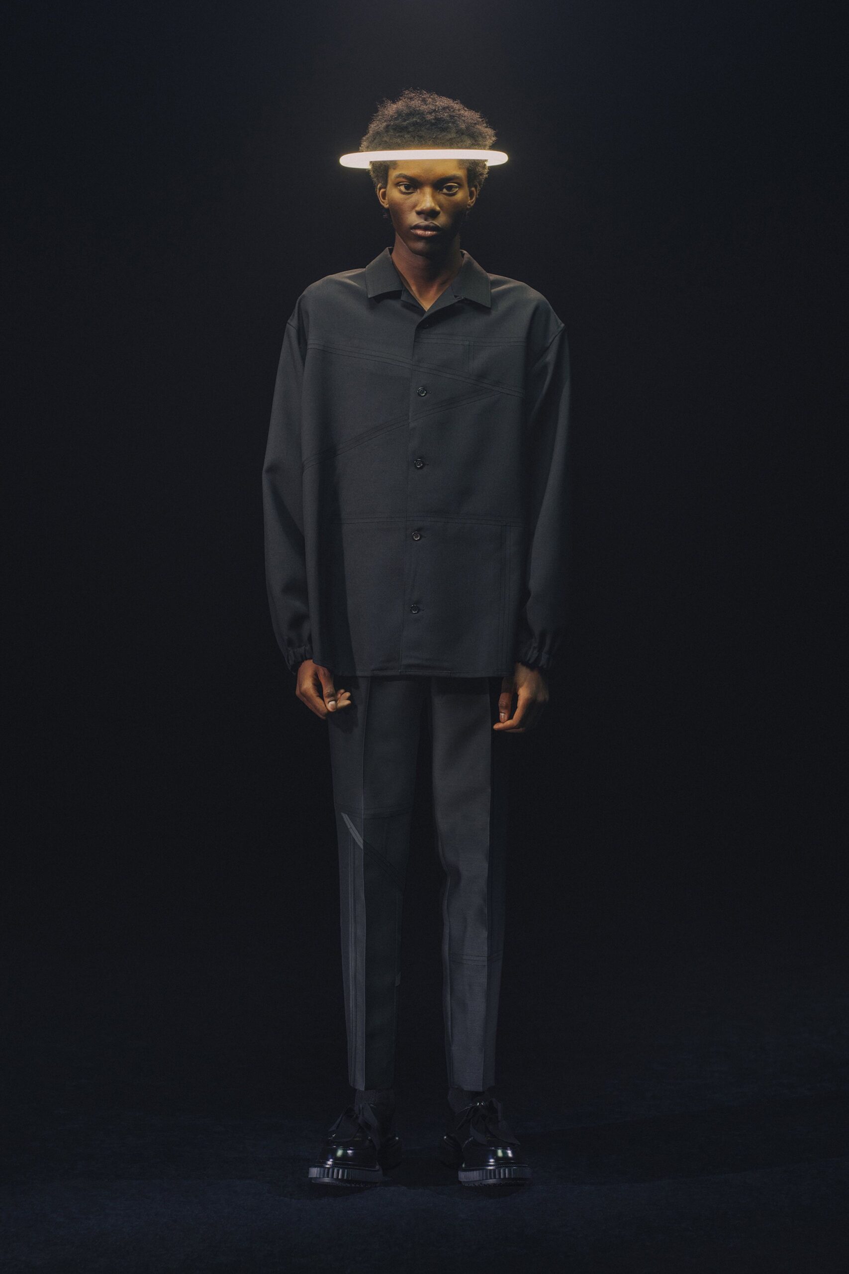 black relaxed shirt with slim pants