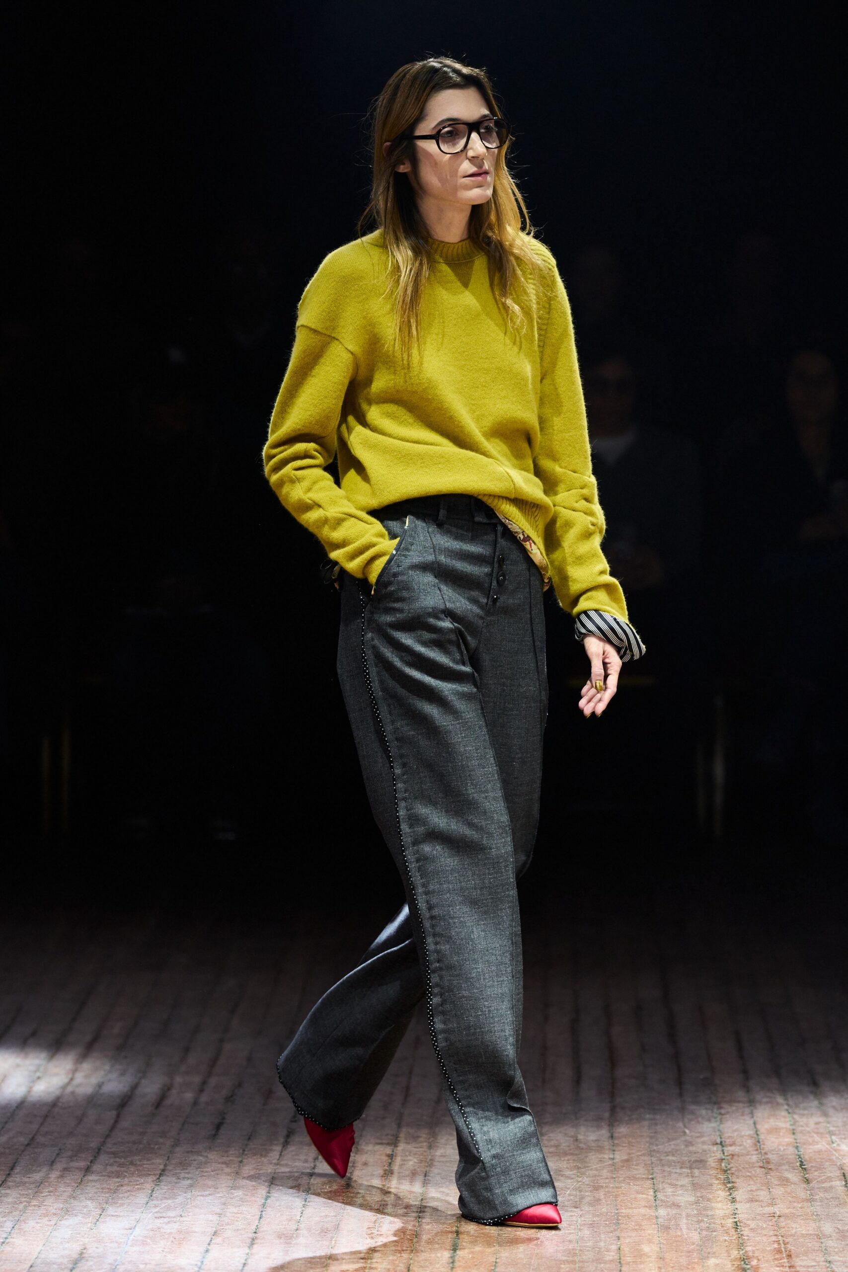 yellow wool sweater with gray pants