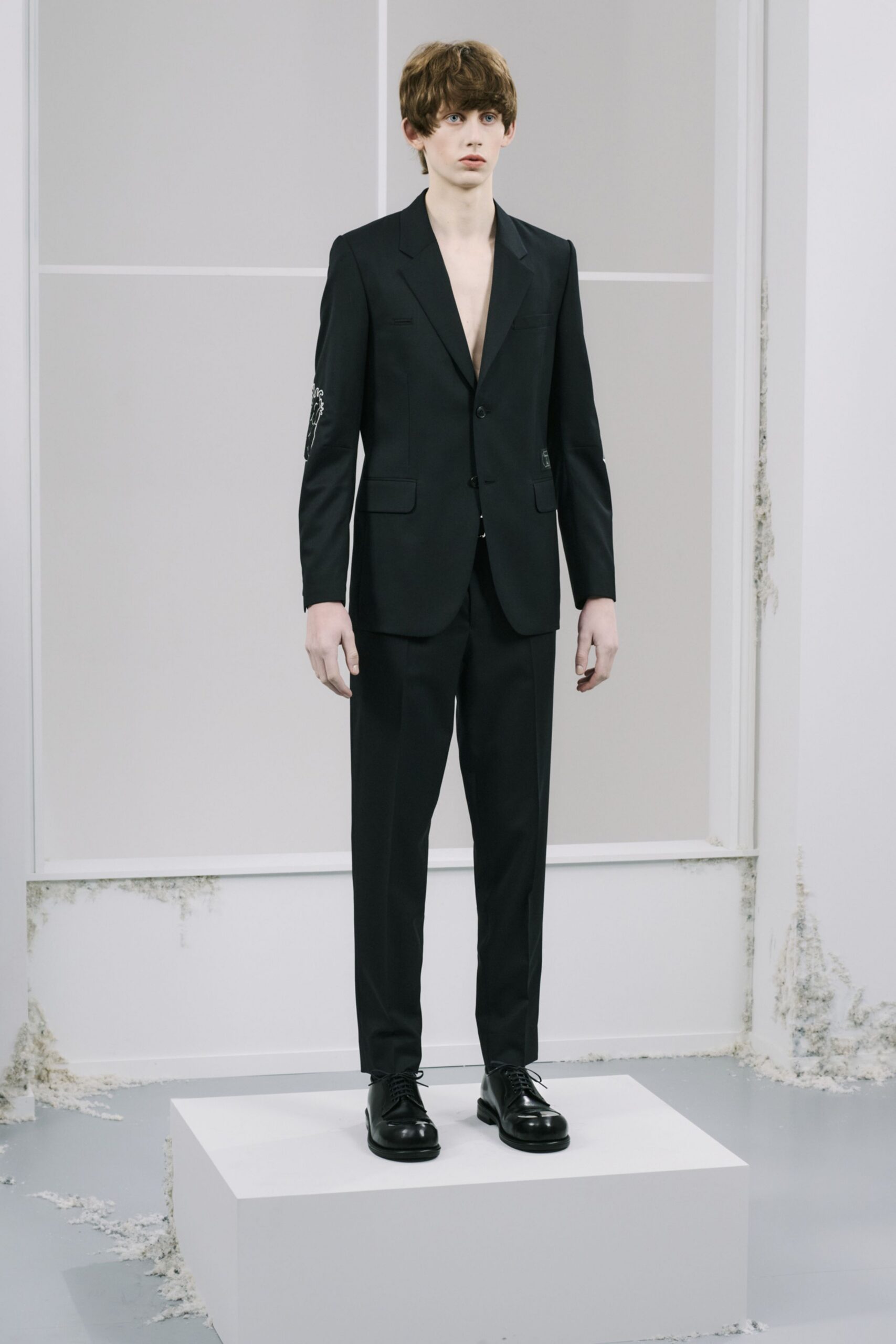 black tailored suit with shoes