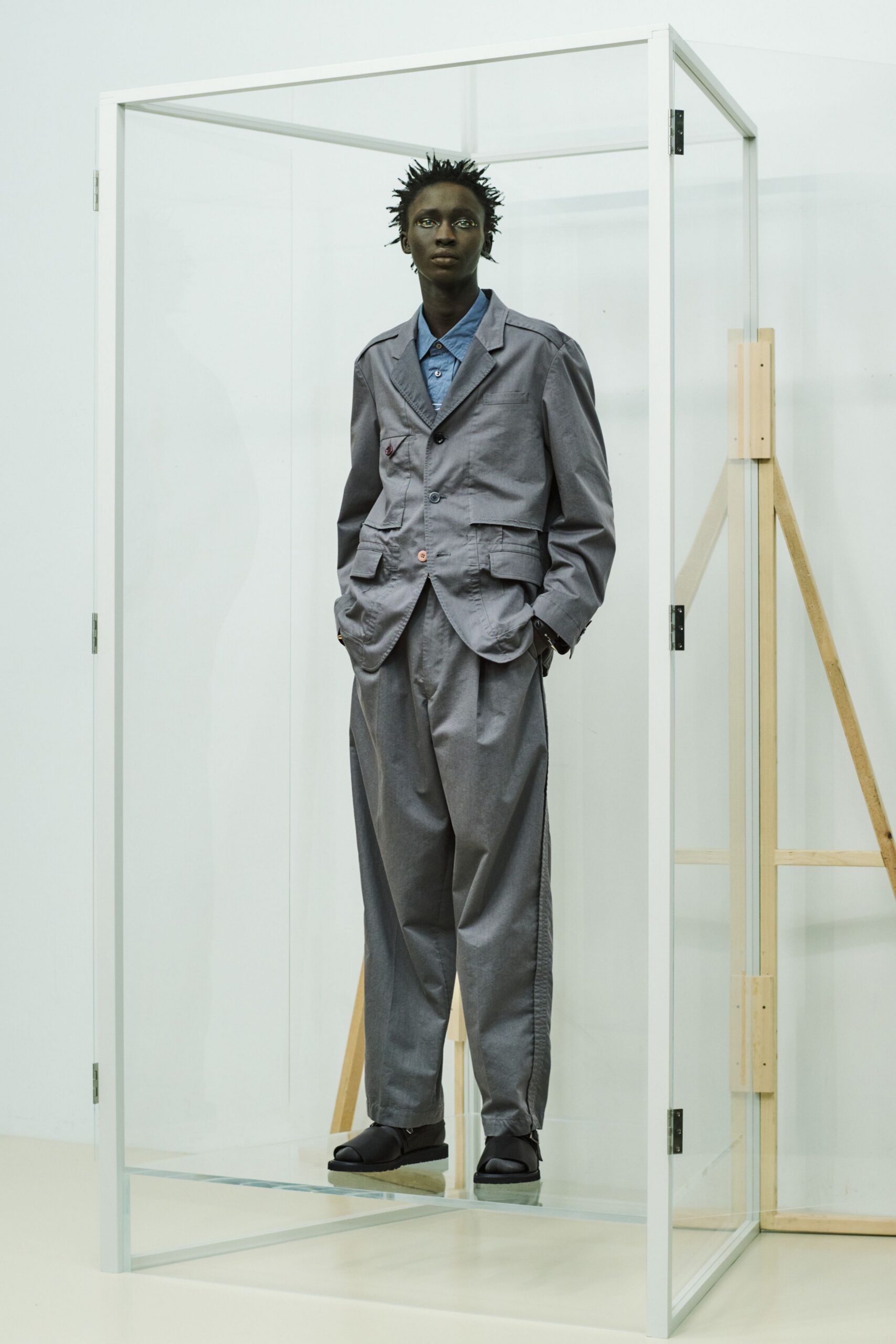 gray relaxed suit with black shoes