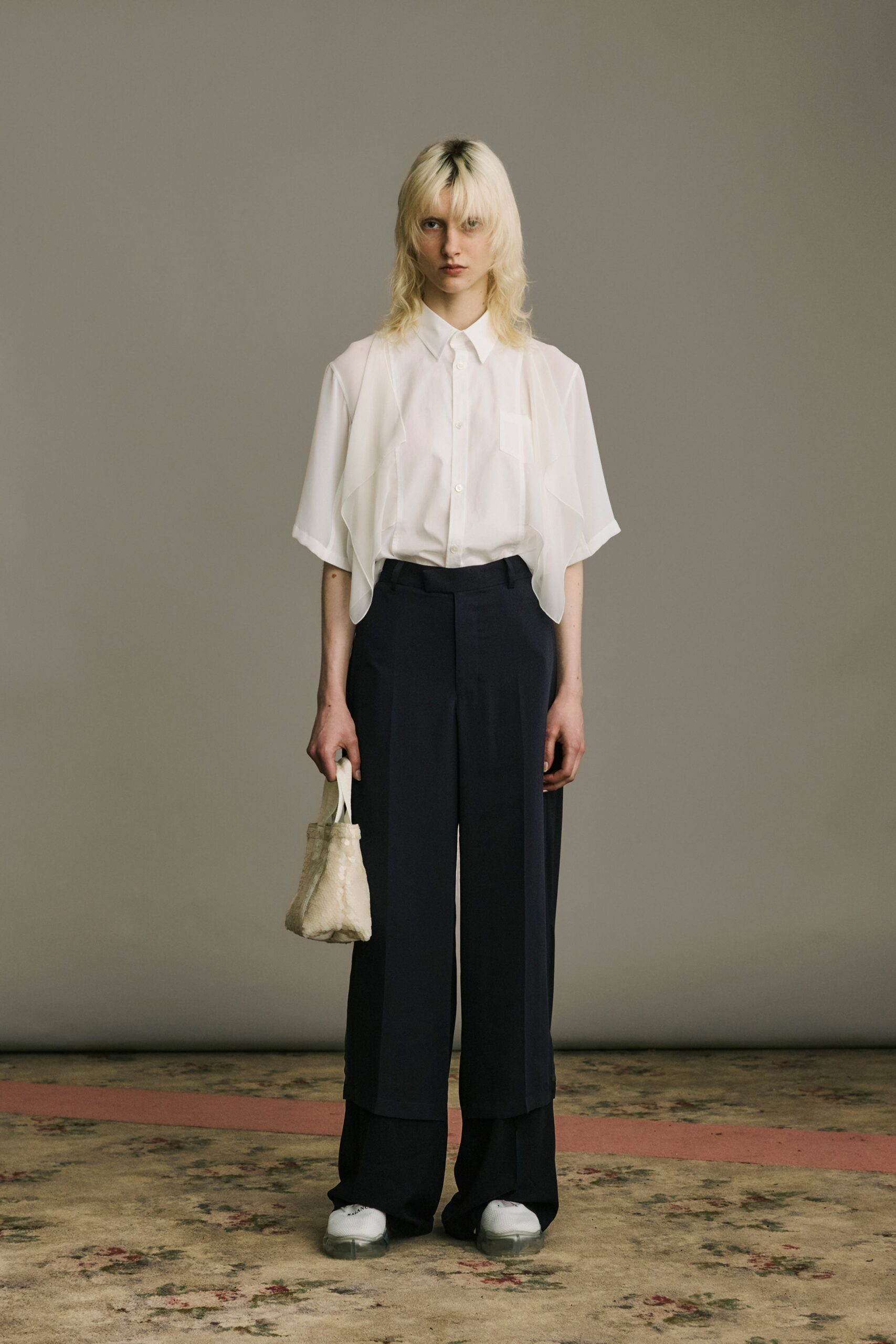 white sheer shirt black tailored pants