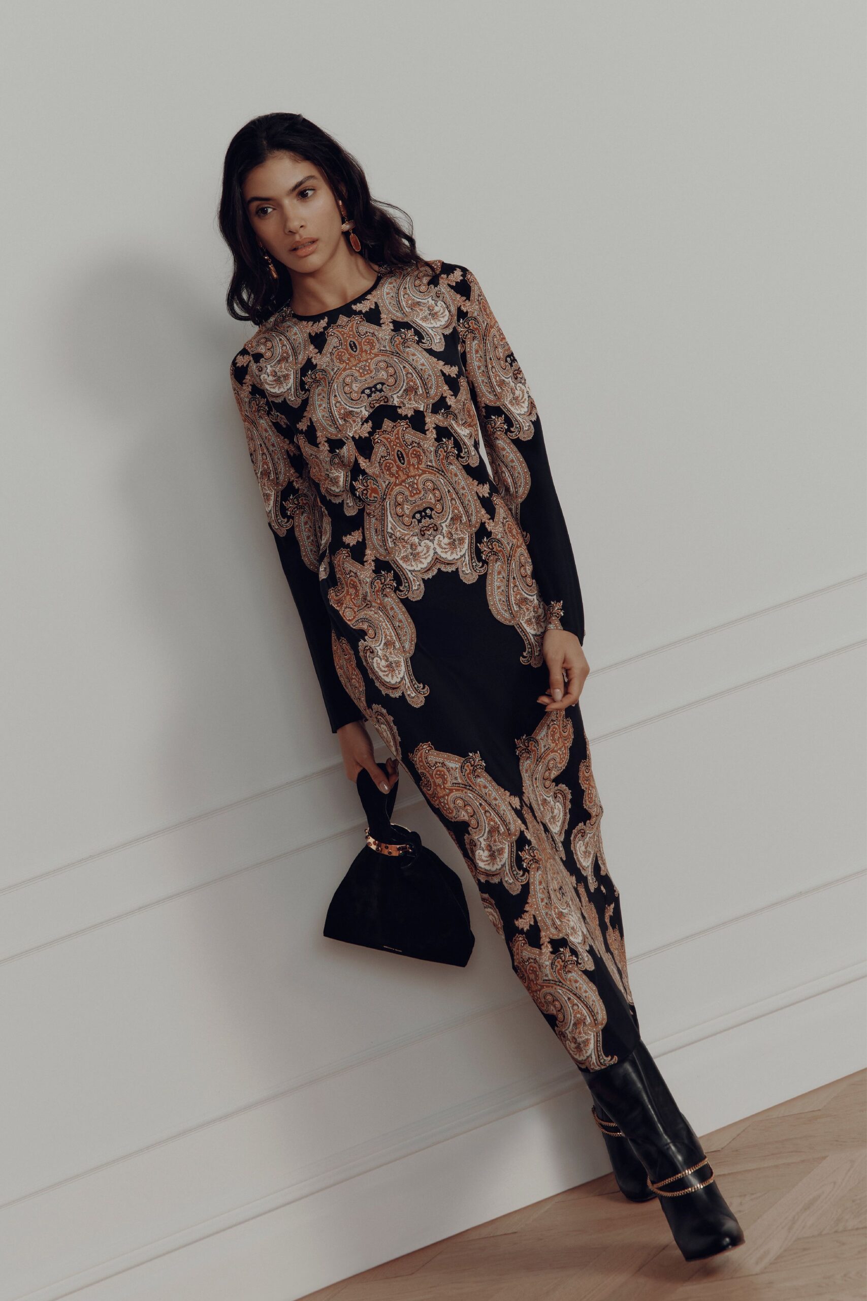 black printed jumpsuit with boots