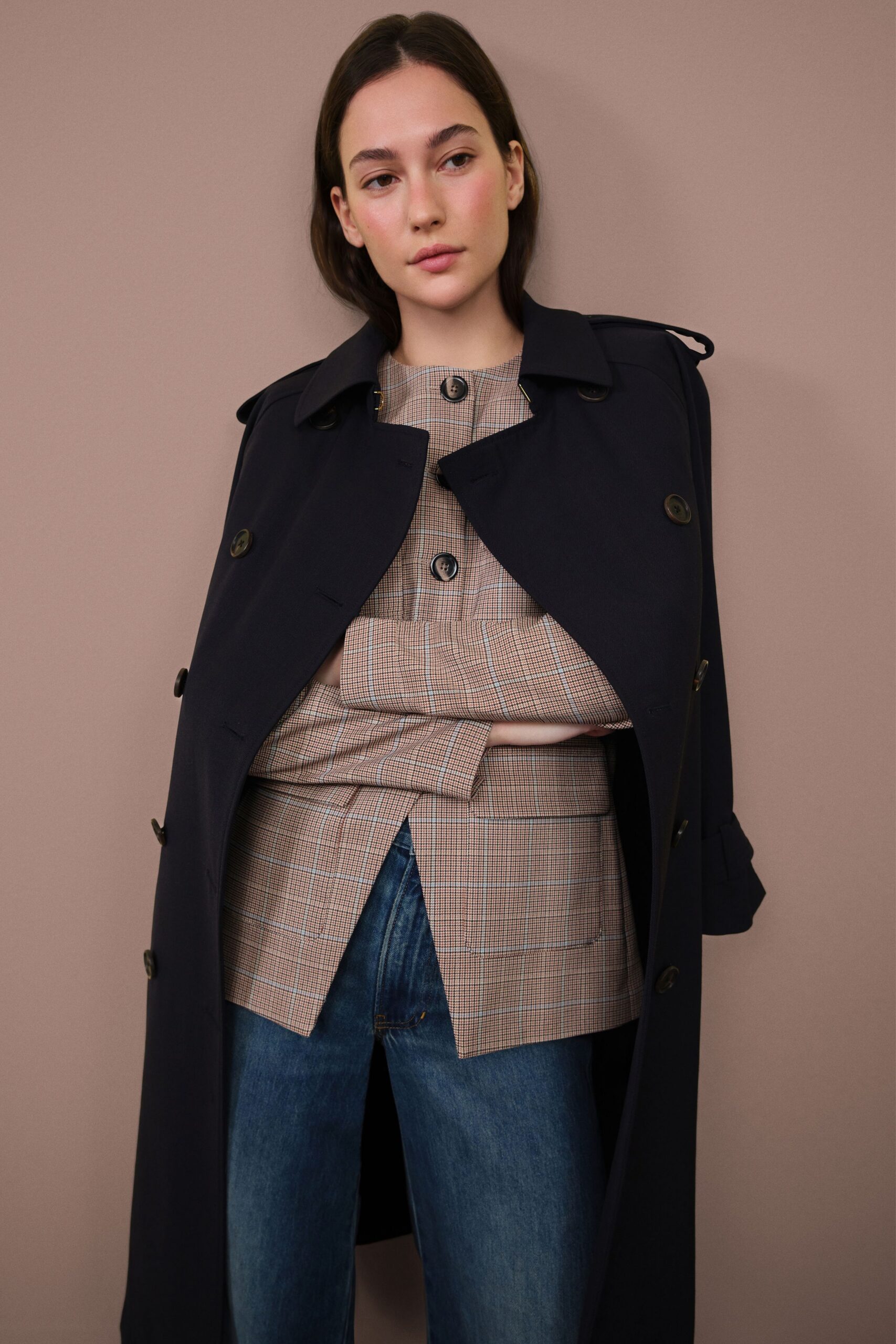 black trench coat with checked shirt