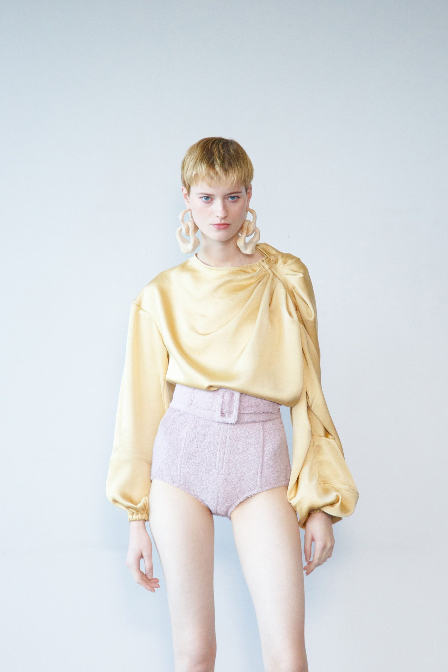 pink cotton high-waisted belted textured shorts