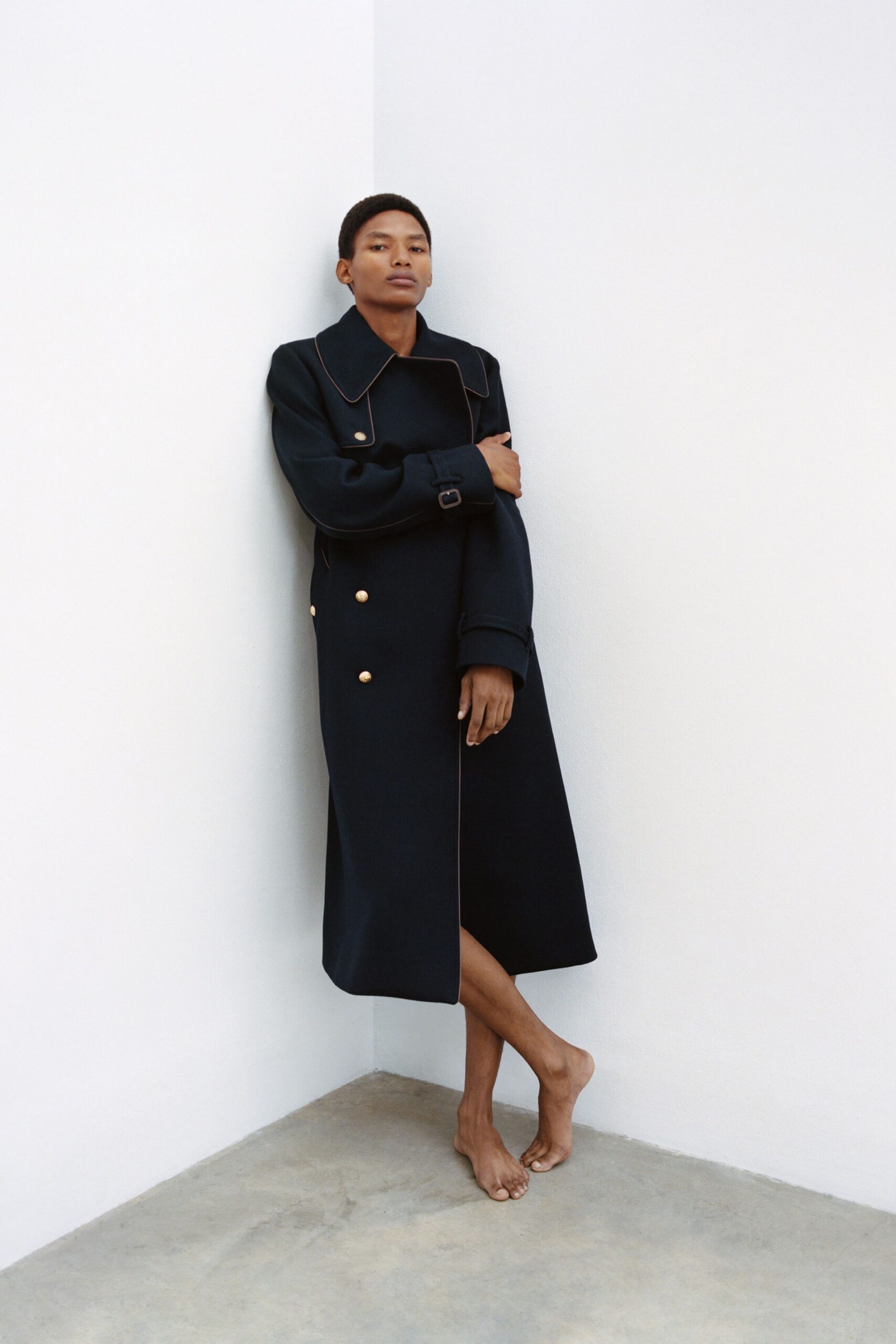 black wool long-sleeve collared fitted buttoned midi coat