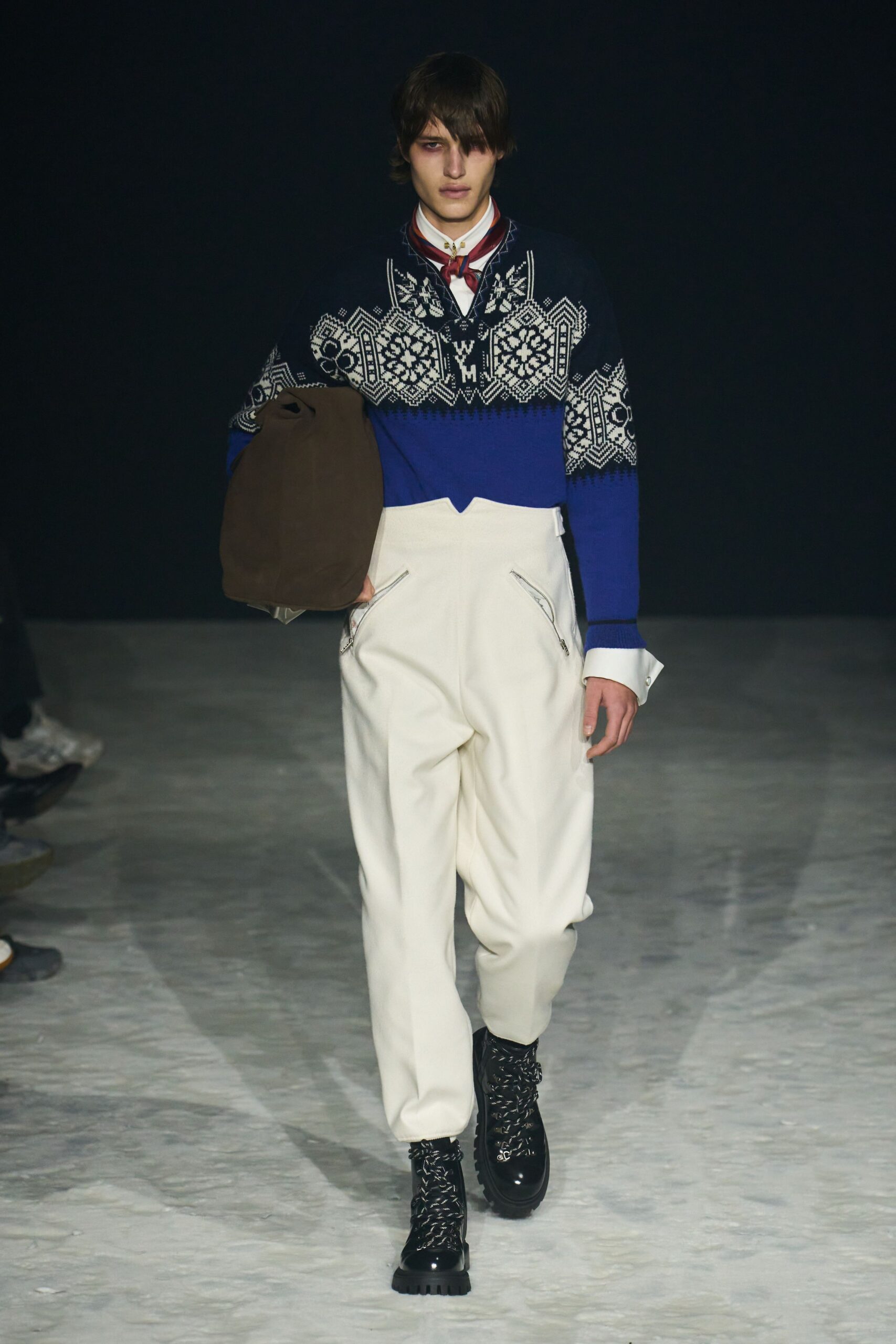 blue embroidered sweater with white pants