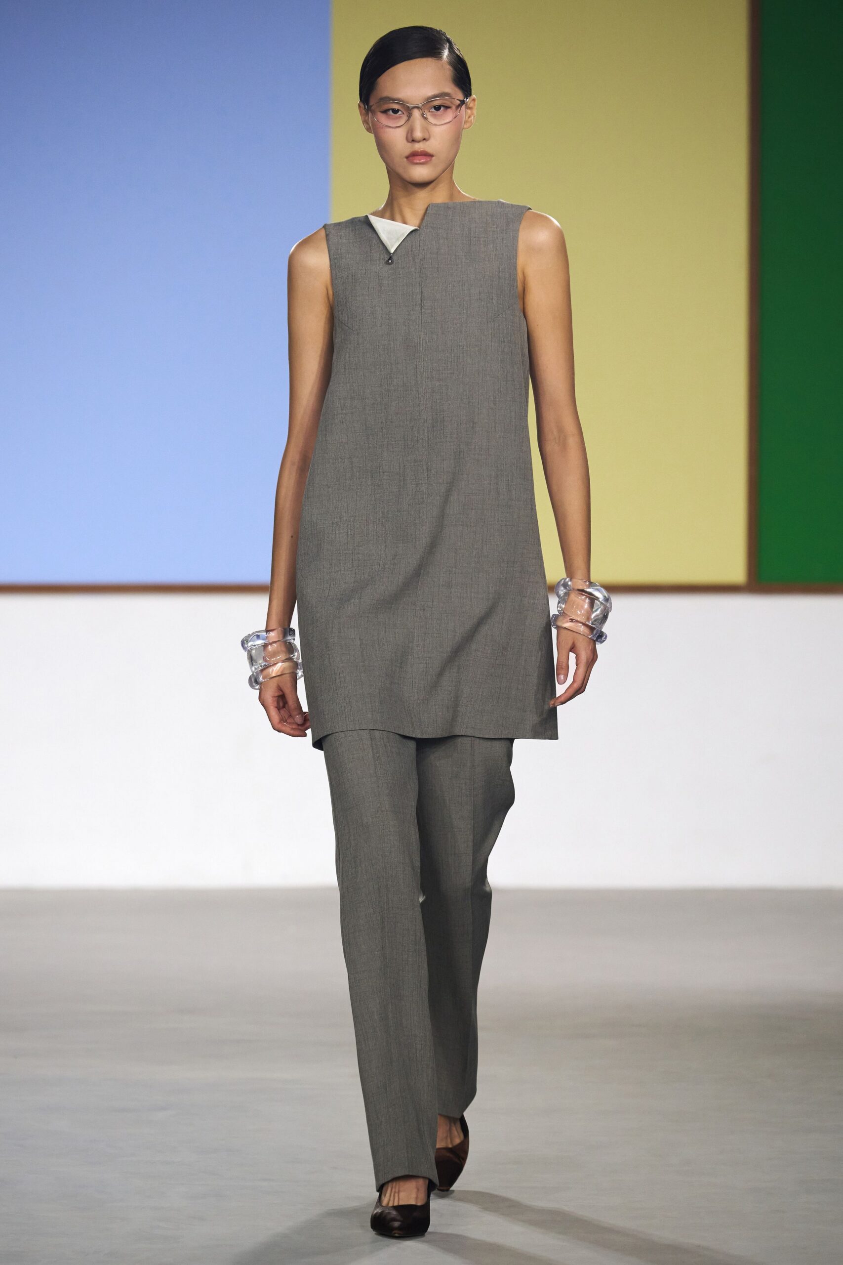 gray sleeveless top with relaxed pants